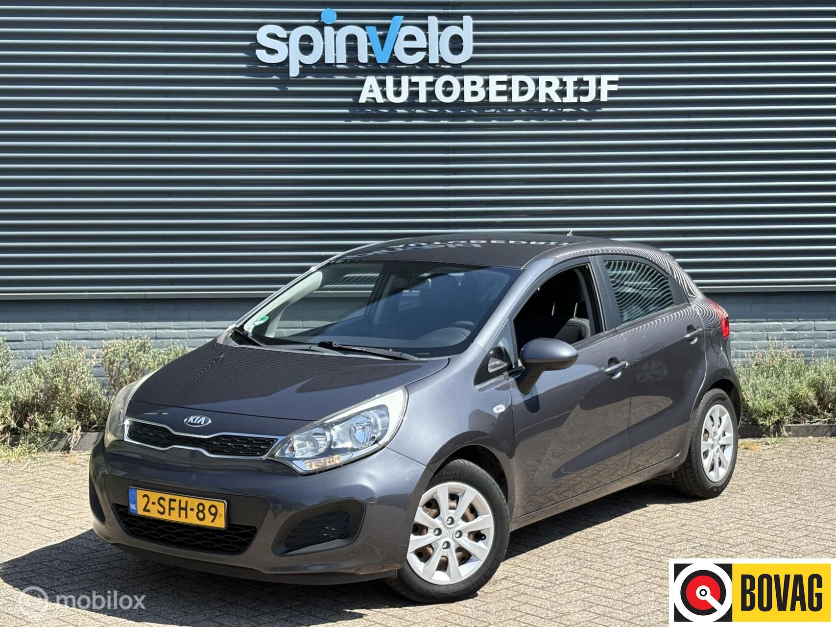 Kia Rio 1.2 CVVT Comfort Pack - Navi - Airco - Nap - 2013 - voorkant