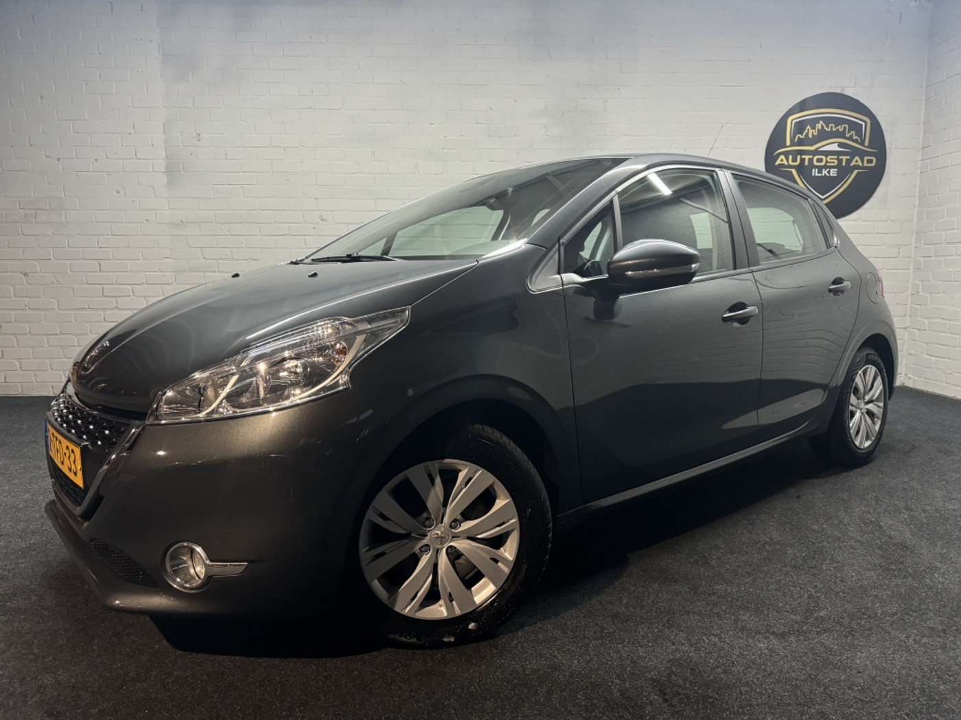 Peugeot 208 1.2 VTi Envy 5-deurs | NL auto | Clima 2014 - voorkant