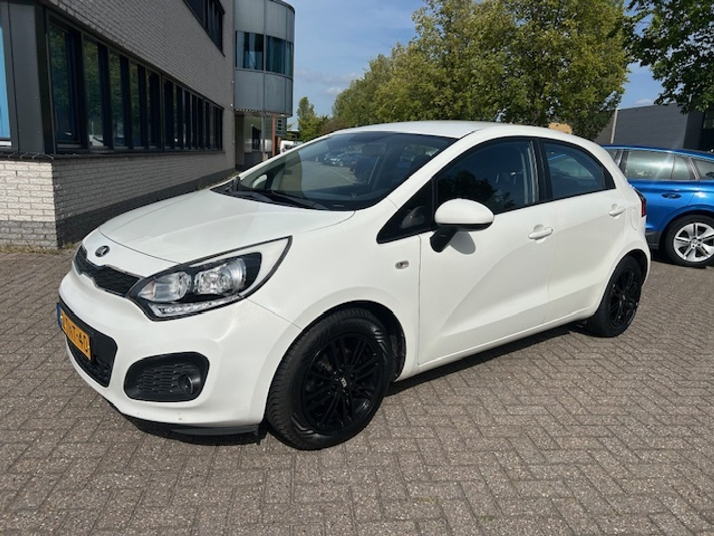 Kia Rio 1.2 CVVT BusinessL. CRUISE BLUETH LED NAP! 2014 - voorkant
