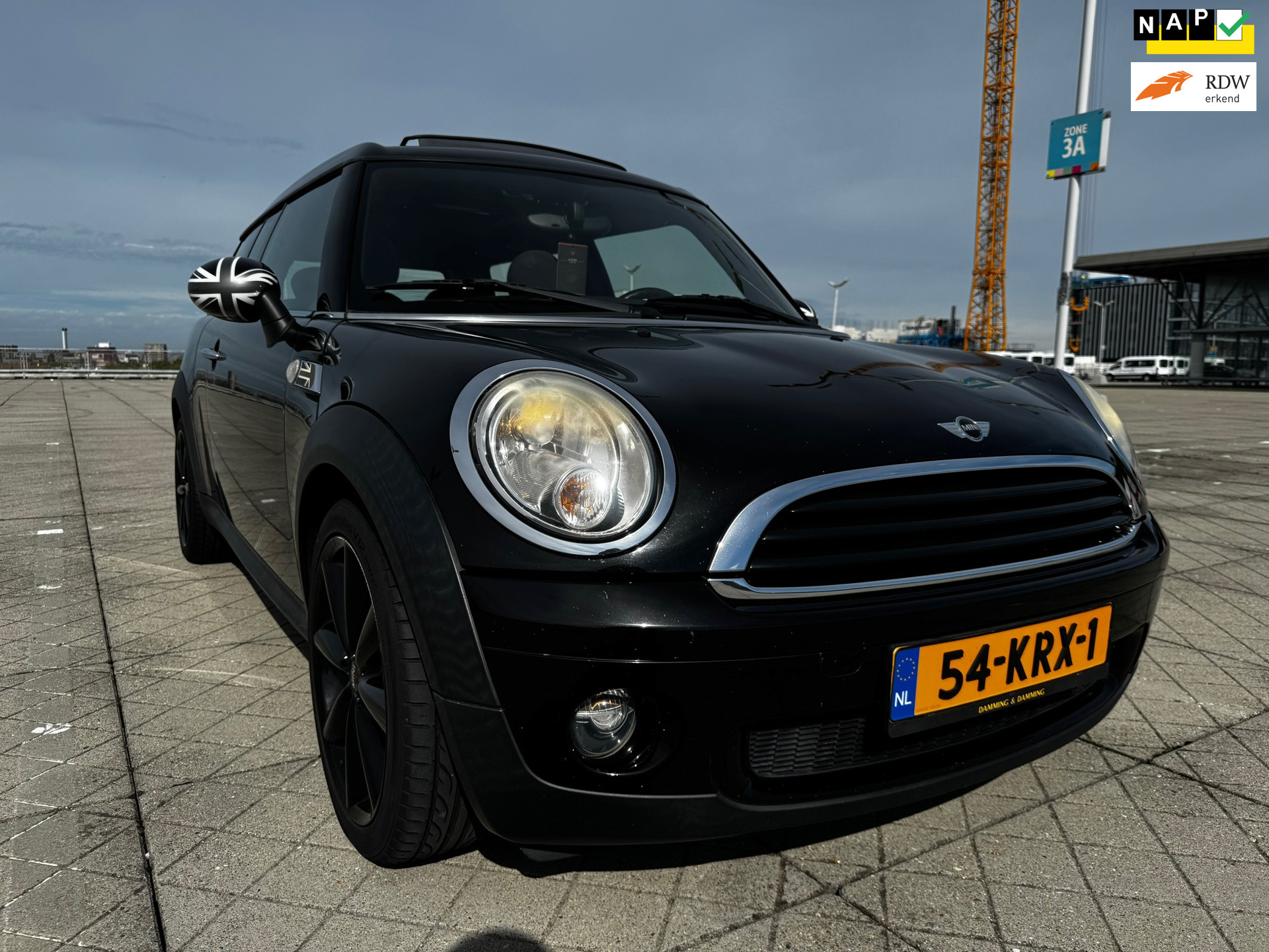 Mini One Clubman 1.4 One Anniversary MK II CRUISE AIRCO PANO NAP 2010 - voorkant
