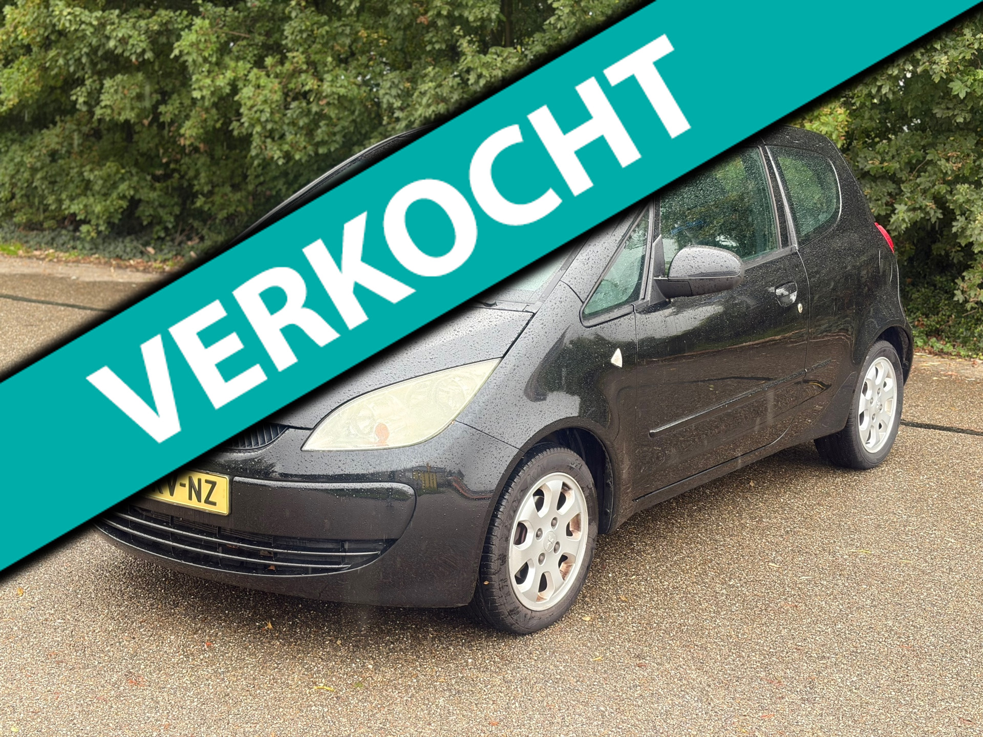 Mitsubishi Mitsubishi Colt 1.3 Invite Airco! 173DKM! NAP! Velgen! Zwart! 2005 - voorkant