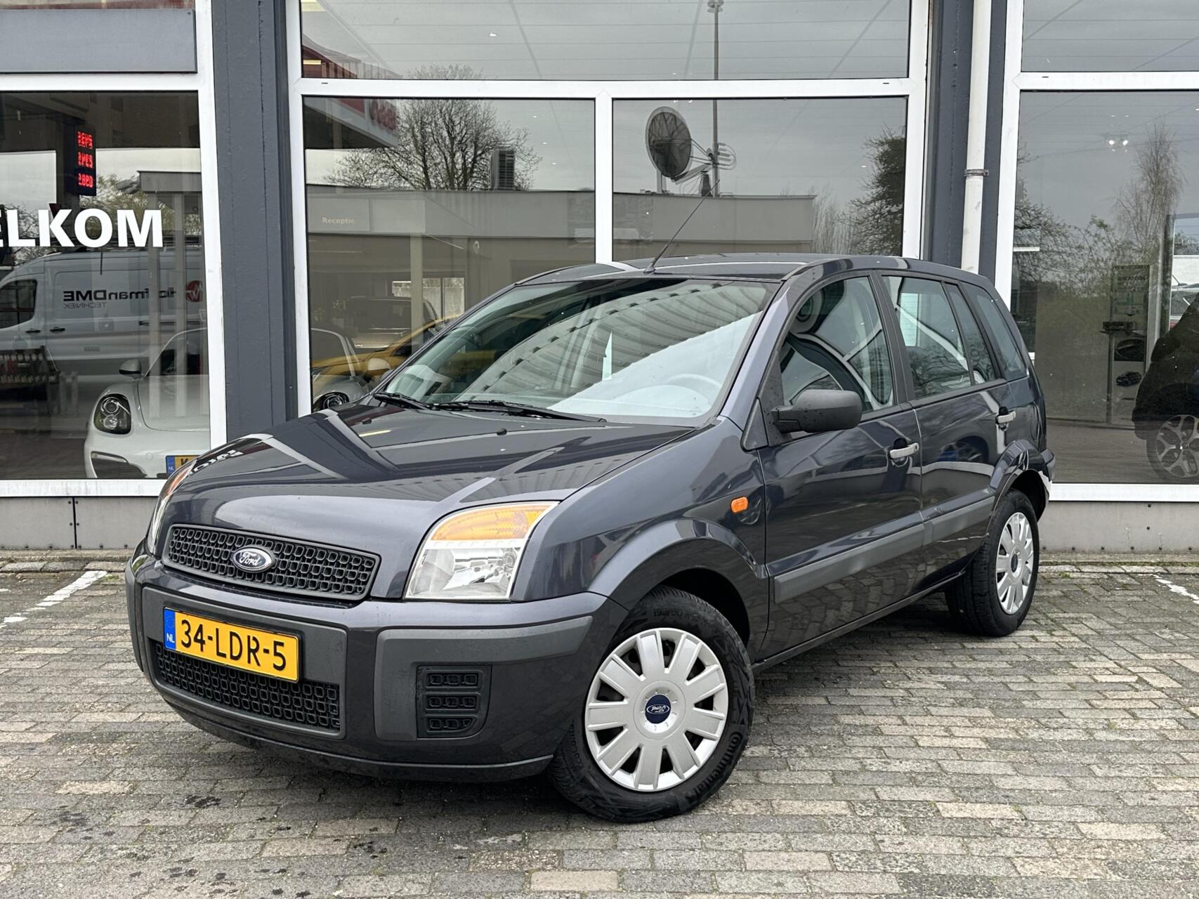 Ford Fusion 1.4-16V Cool & Sound|Airco|1e eigenaar|Dealer o. 2010 - voorkant