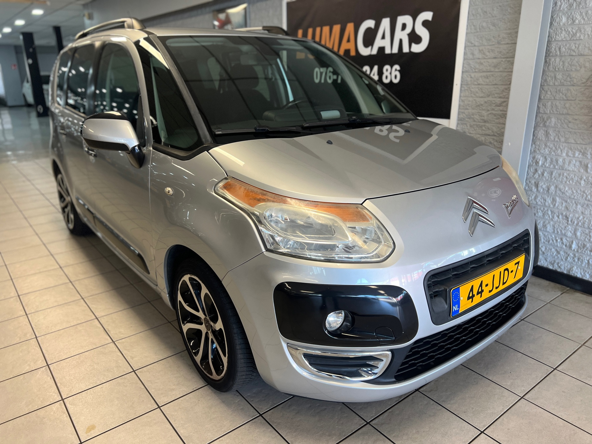 Citroen C3 Picasso 1.6 VTi Exclusive | APK 2027 | Cruise | 2009 - voorkant