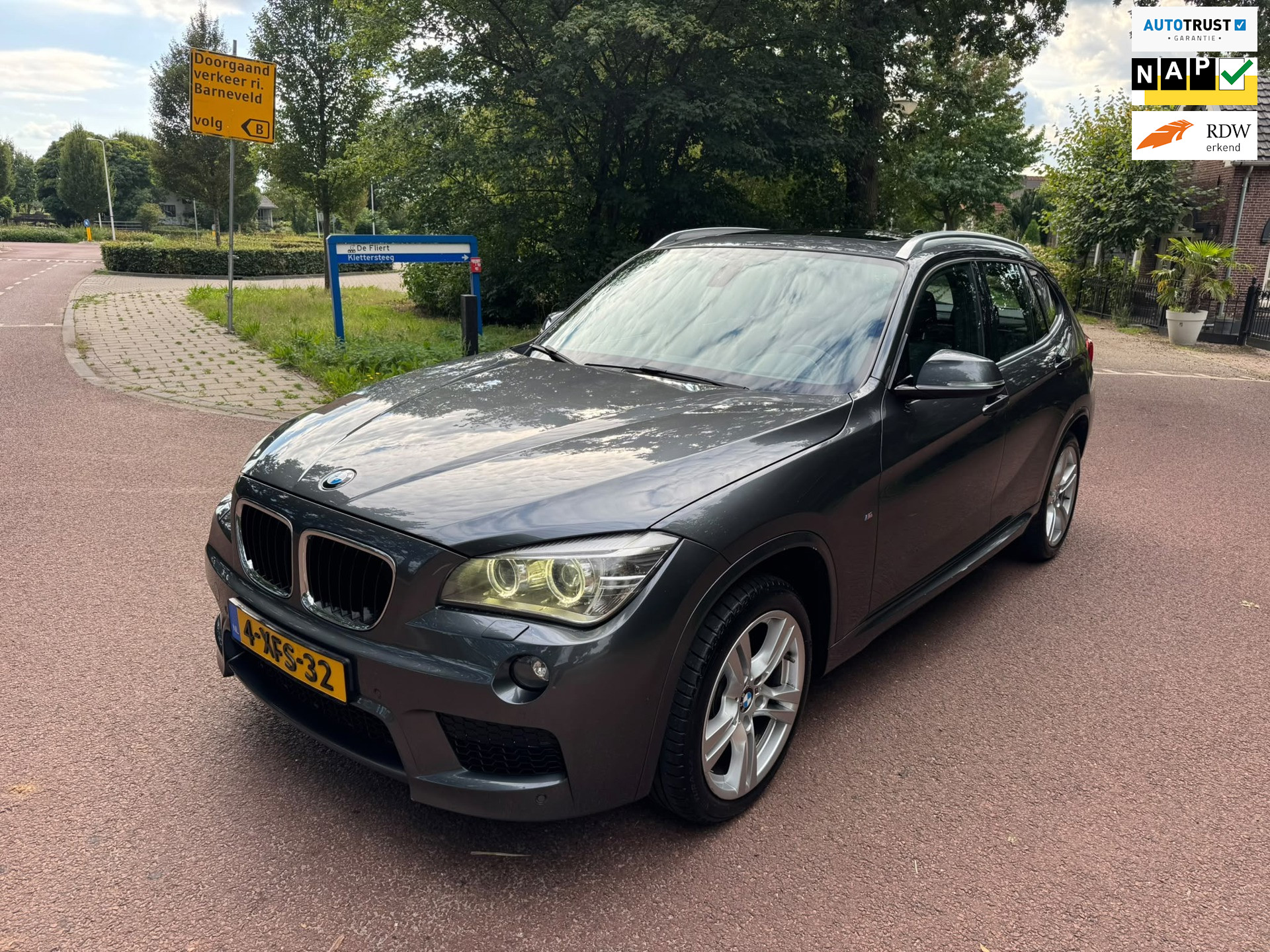 BMW X1 Sdrive20i SDrive20i High Executive / Navi / Pano / Xenon / Leder / NAP / 2014 - voorkant