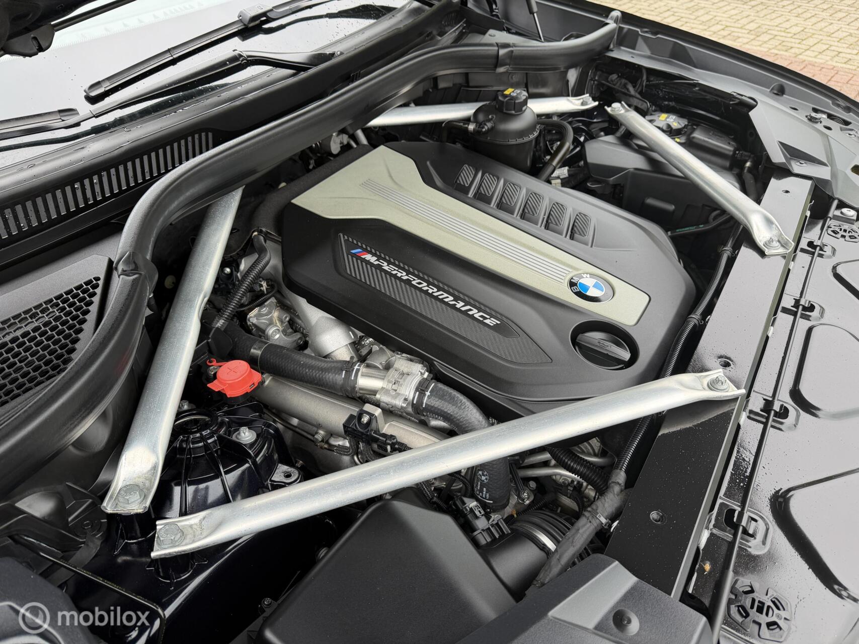 Foto van BMW X5 M50d