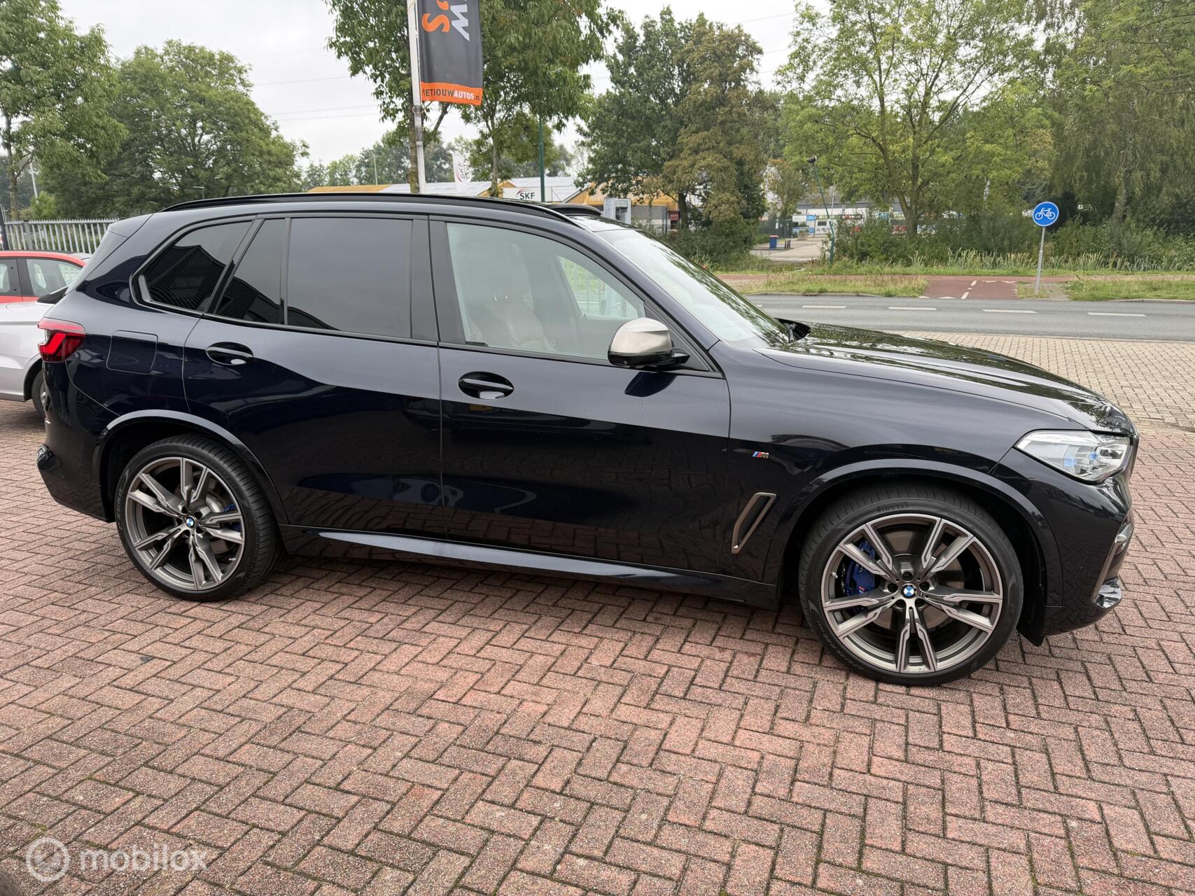 Foto van BMW X5 M50d