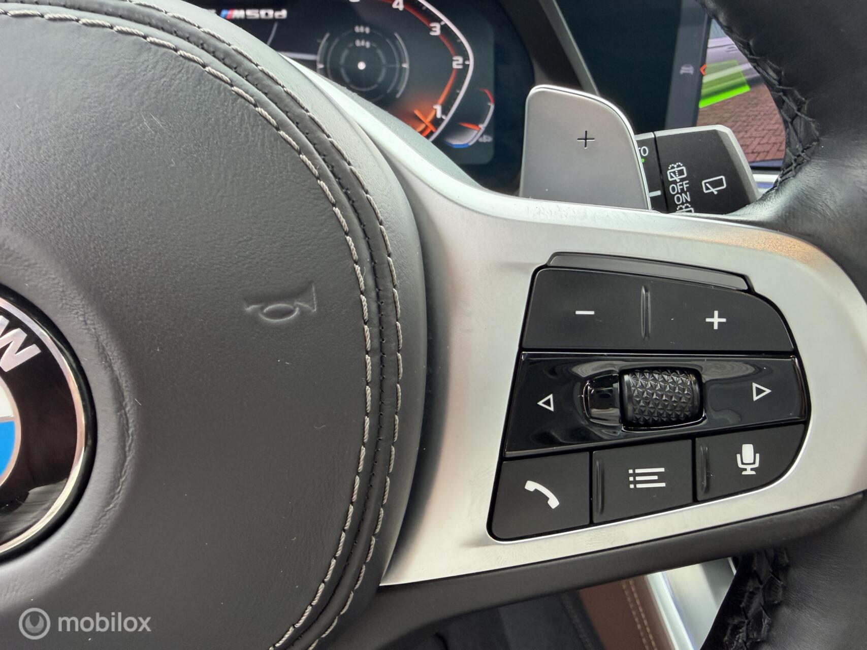 Foto van BMW X5 M50d