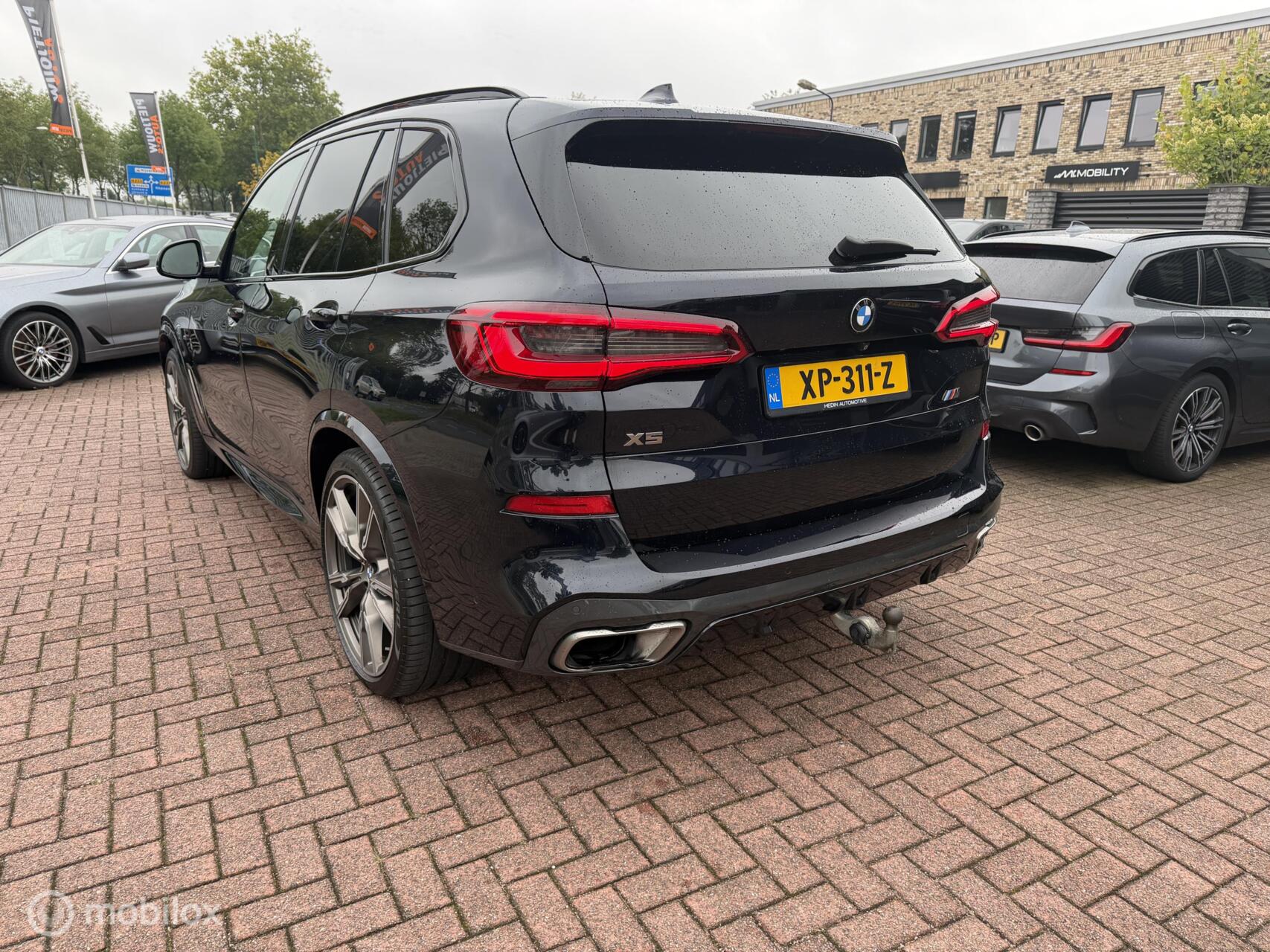 Foto van BMW X5 M50d