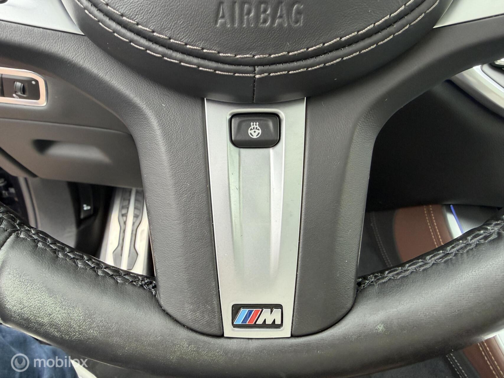 Foto van BMW X5 M50d
