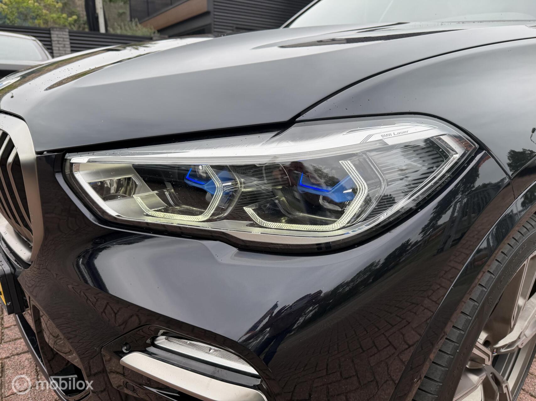 Foto van BMW X5 M50d
