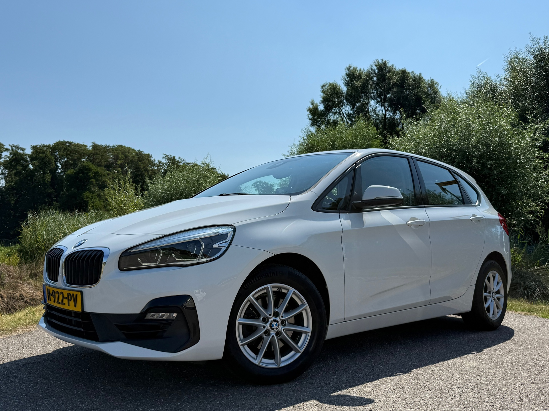 BMW 218i Active Tourer 218i Executive Edition Automaat | Apple CarPlay & Android Auto | Head-Up | Navi | Clima | LED | Cruise | 2020 - voorkant