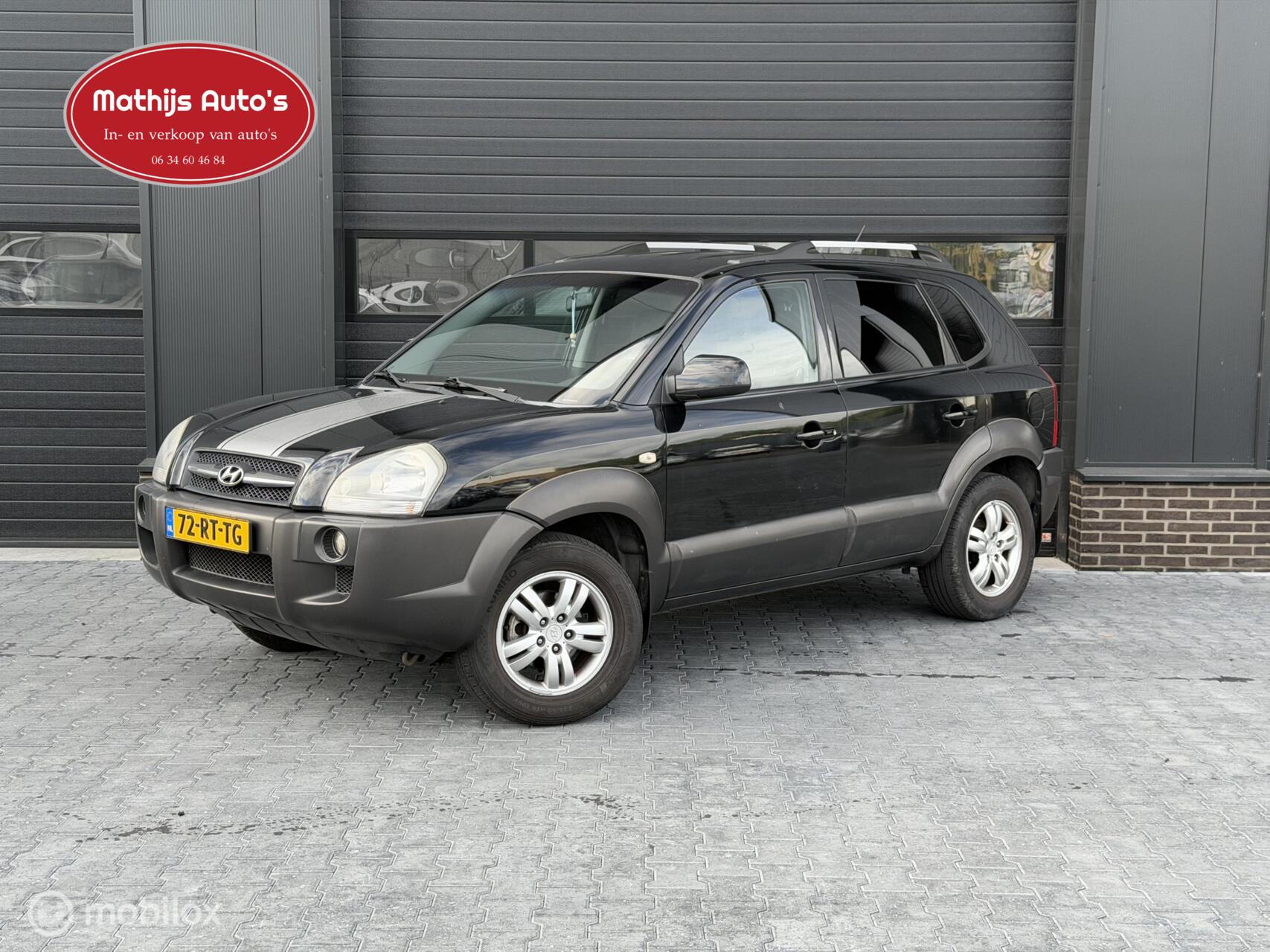 Hyundai Tucson 2.0i   climate+cruise contr/trekh/lm-velgen. 2005 - voorkant