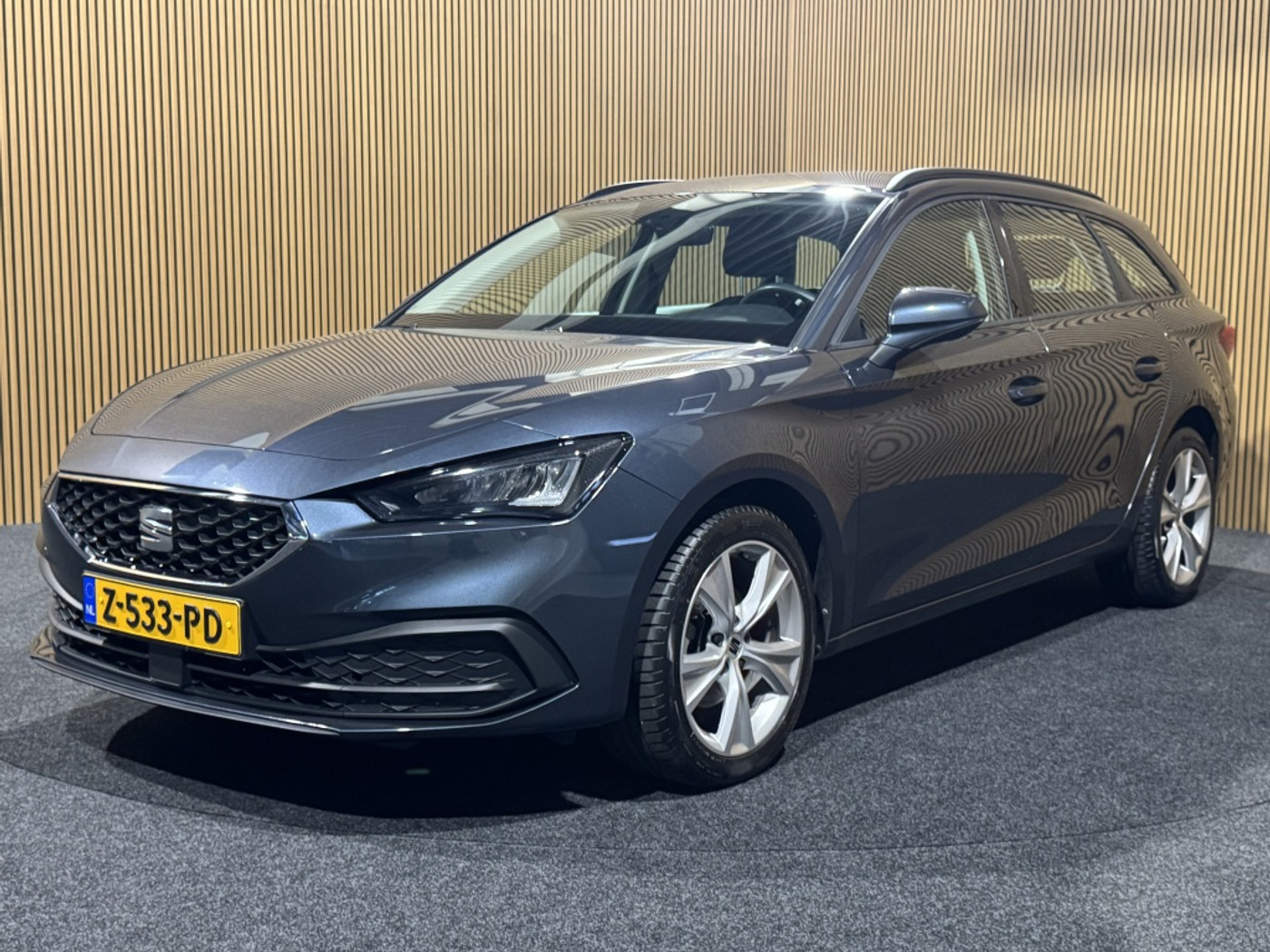 Seat Leon Sportstourer 1.5 eTSI Style Business | Stoel/stuurverwarming | CarPlay | Ad.Cruise | Clima | 2021 - voorkant