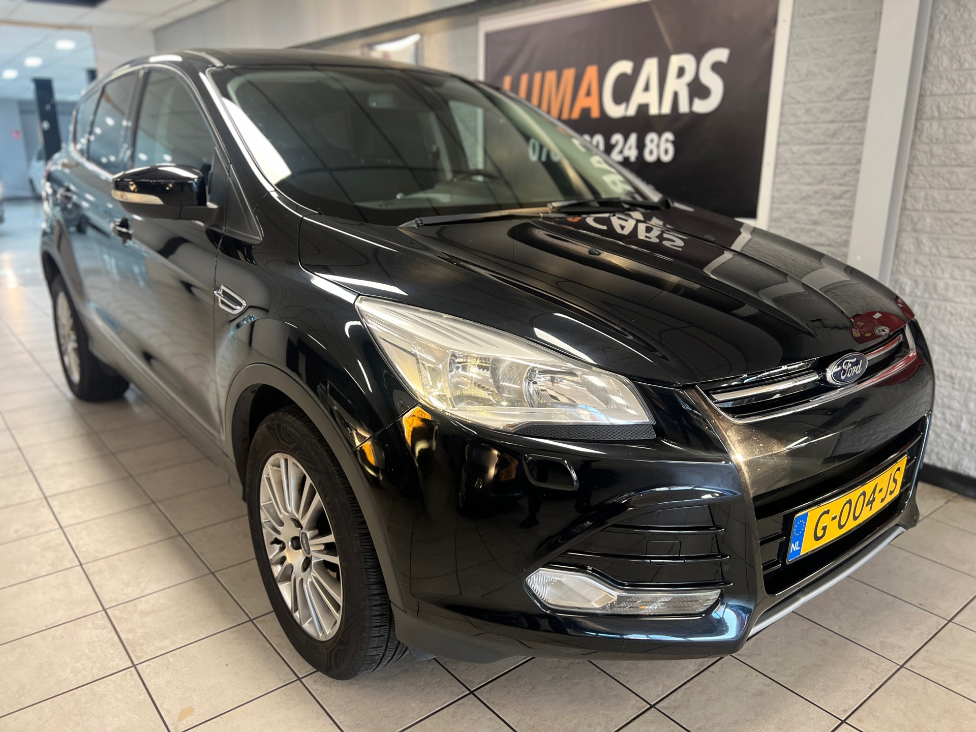 Ford Kuga 1.6 Titanium | APK 2027 | Cruise | Stoelverw. |PDC 2014 - voorkant