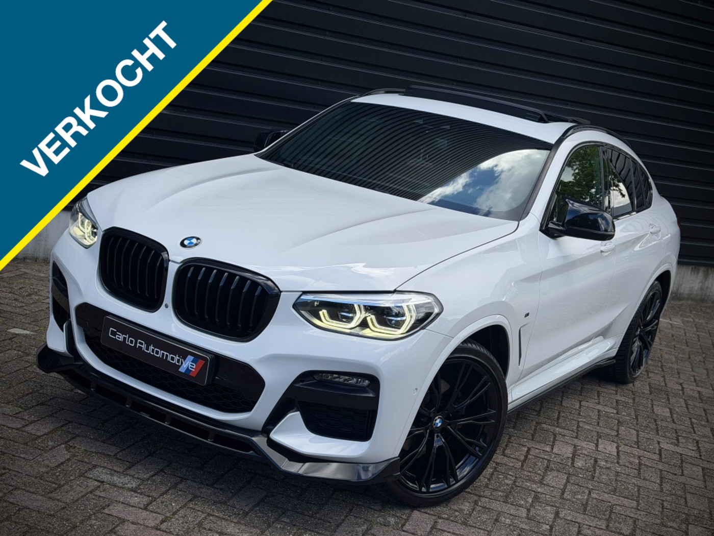 BMW X4 Xdrive20i xDrive20i M-PERFORMANCE PANO|HUD|360|H/K|THAAK 2019 - voorkant