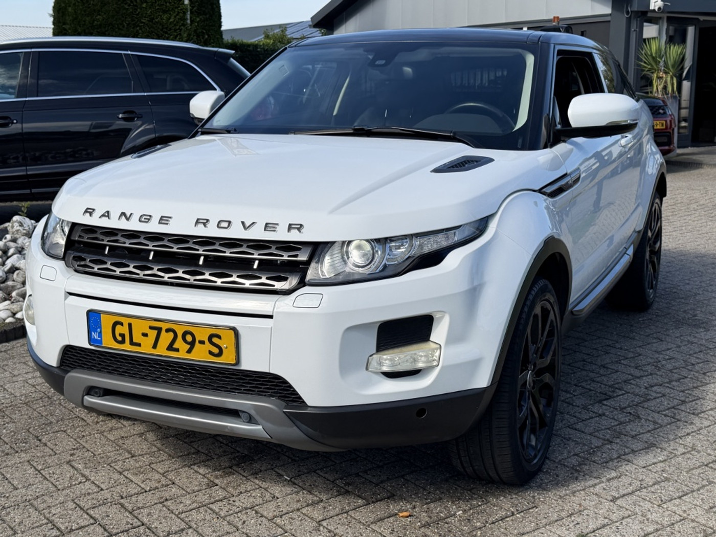 Land Rover Range Rover Evoque 2.0 SI Benzine 4WD Prestige Automaat Wit / Zwart 2012 - voorkant