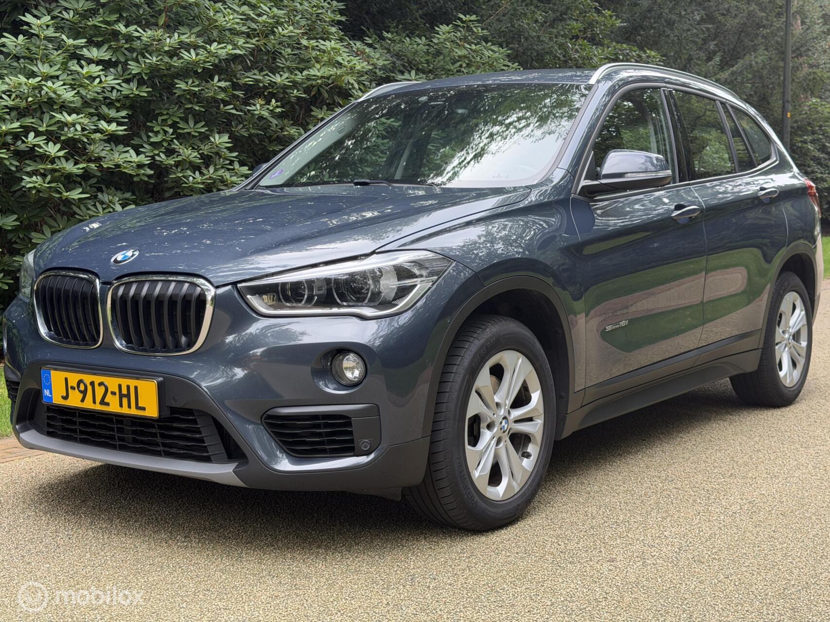 BMW X1 Sdrive18i sDrive18i High Executive Trekhaak Cruise Clima Stoelv 2017 - voorkant