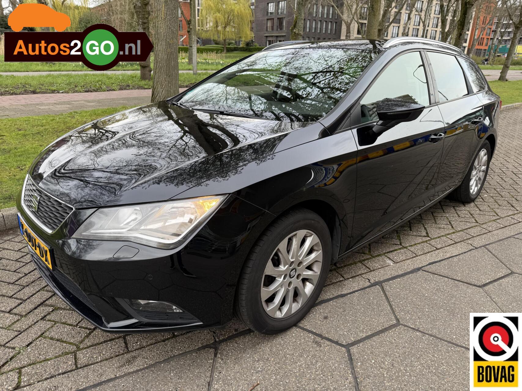 Seat Leon ST 1.2 TSI Style Business I Navi I cruise controle I clima I winterset compleet I parkeersensor I rijklaar I 2014 - voorkant