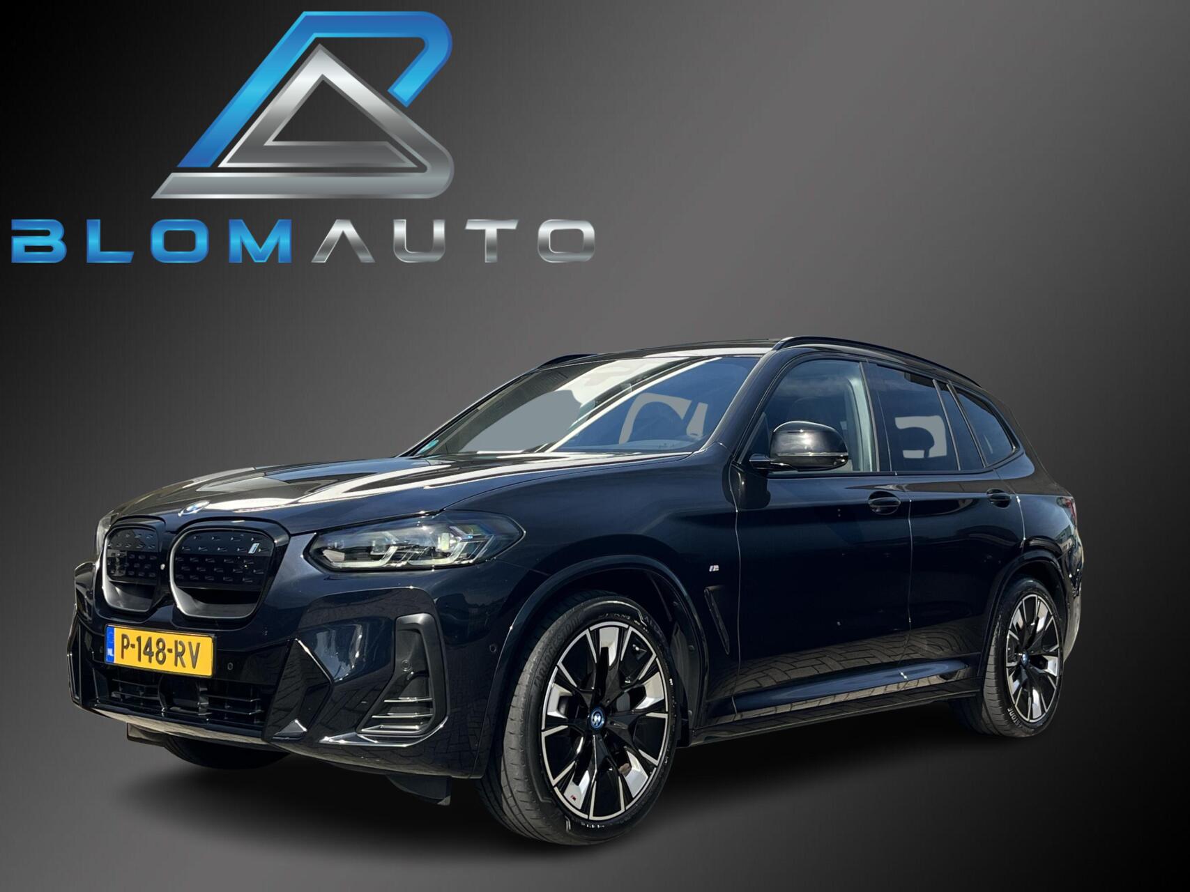 BMW Ix3 High Executive 80 kWh M-SPORT PANO+TREKHAAK SOH 99% 2022 - voorkant