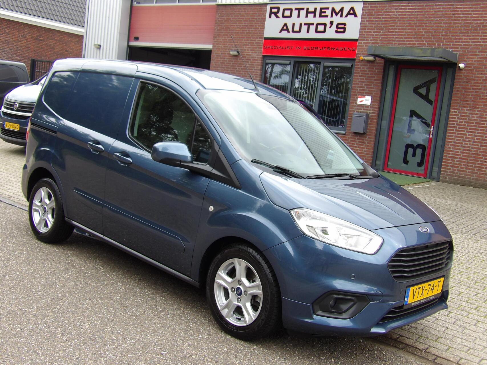 Ford Transit Courier 1.0 BENZINE 100PK 2023 VELE EXTRA'S TOPSTAAT 1e EIGENAAR 2023 - voorkant