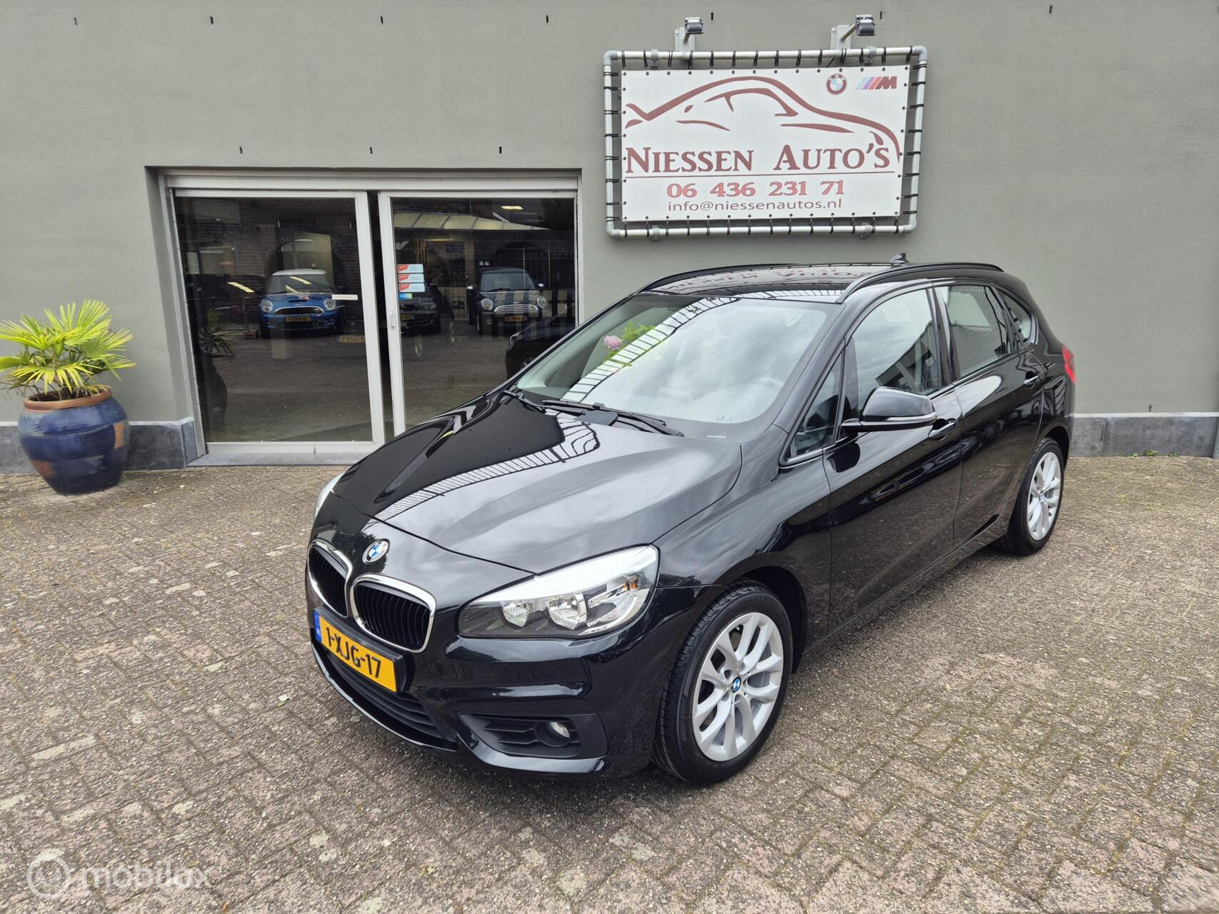 BMW 2-serie Active Tourer 218i Executive NAP/Trekhaak 2014 - voorkant