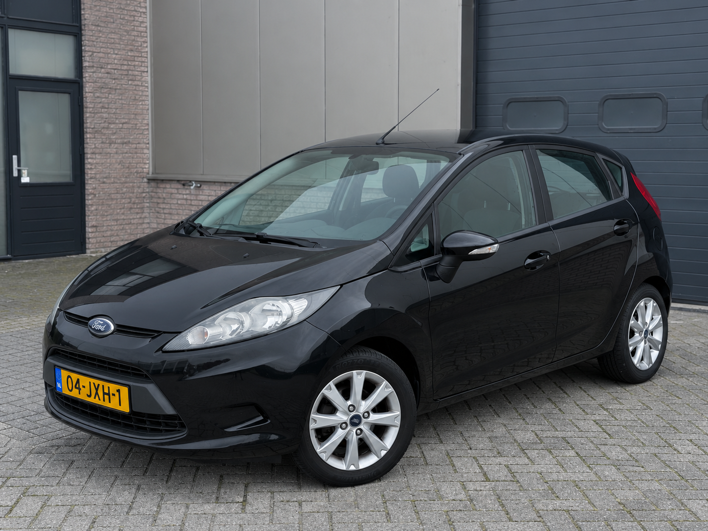 Ford Fiesta 1.25 Titanium 5-DRS Airco/Aux NL Auto 2009 - voorkant