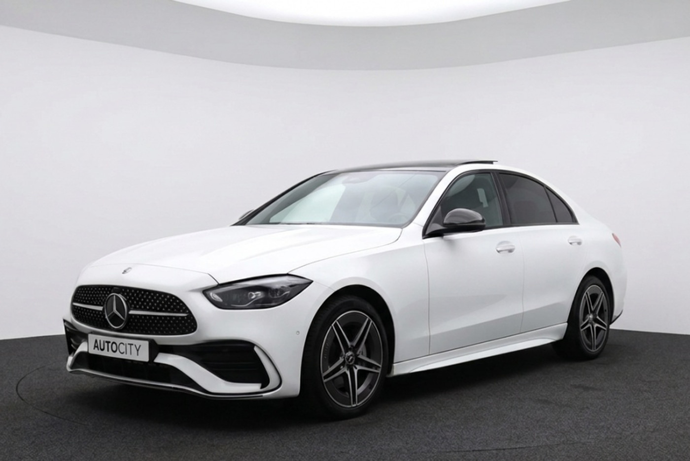Mercedes-Benz C 300 E 4Matic C 300 e 4Matic AMG Line l Pano l Burmester l Memory l VOL OPTIE 2023 - voorkant