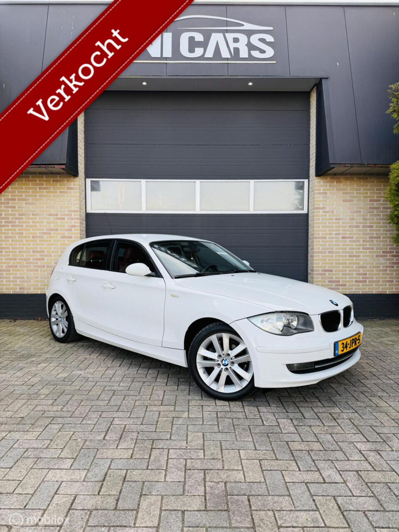 BMW 1er Reihe 116i Corporate|Cruis|Airco|leder|New Ketting| 2009 - voorkant