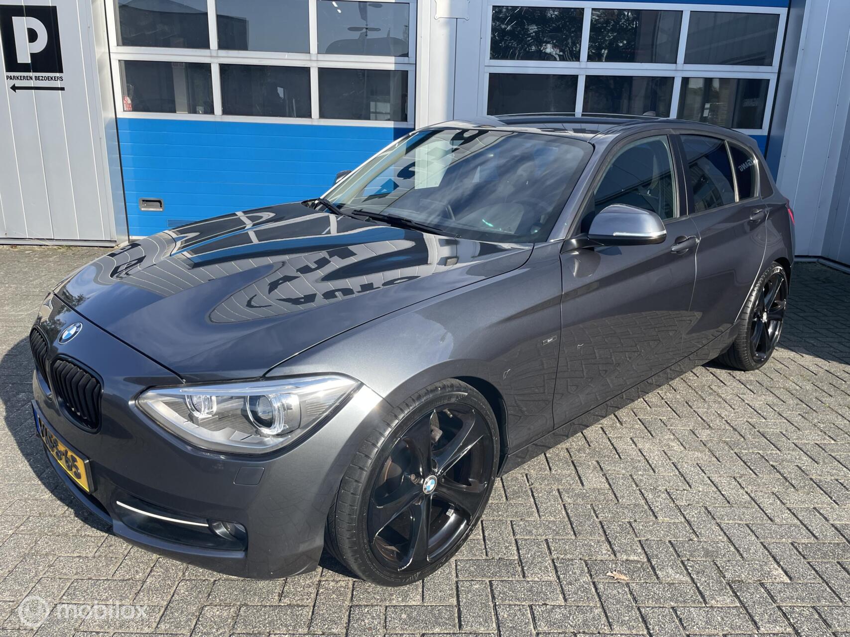BMW 1-serie 114i EDE Bns Sport. 2013 - voorkant