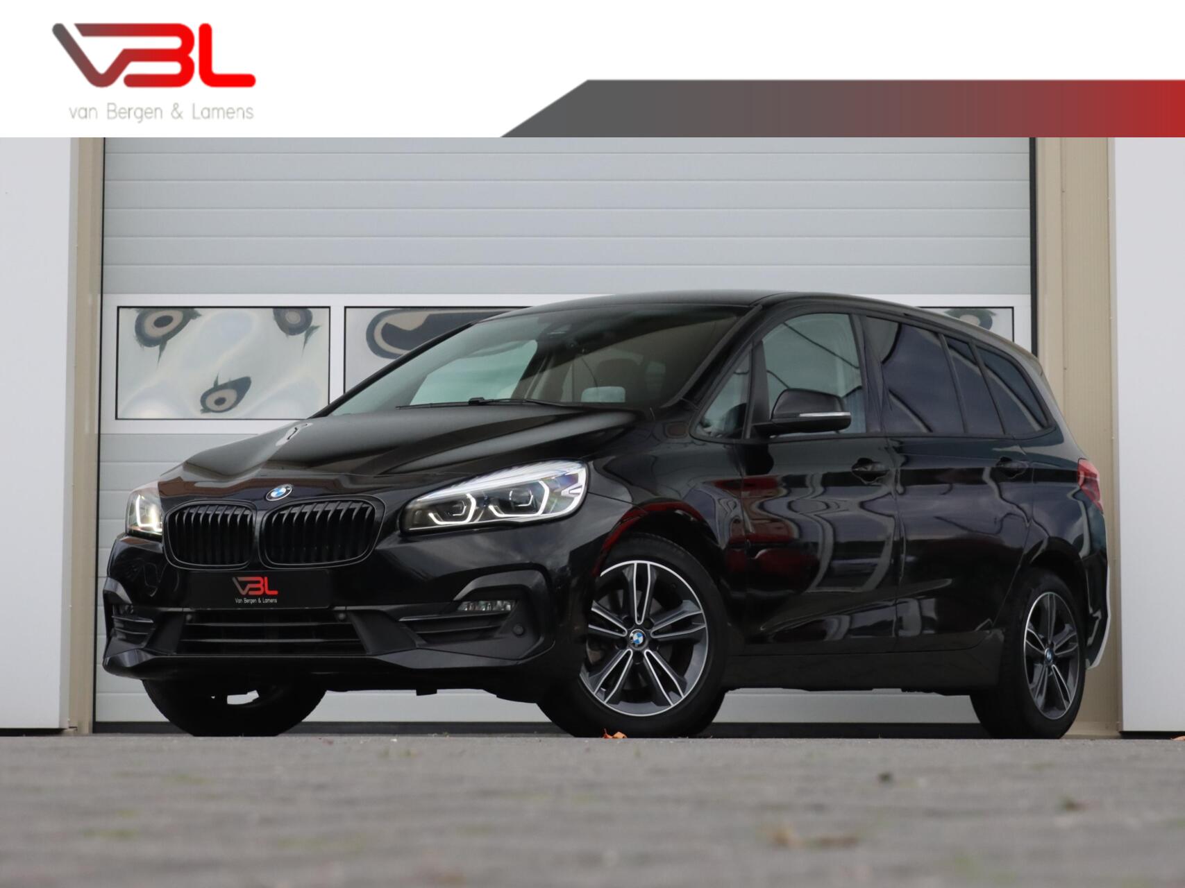 BMW 218i Gran Tourer 218i High Executive | Hoge zit 2021 - voorkant