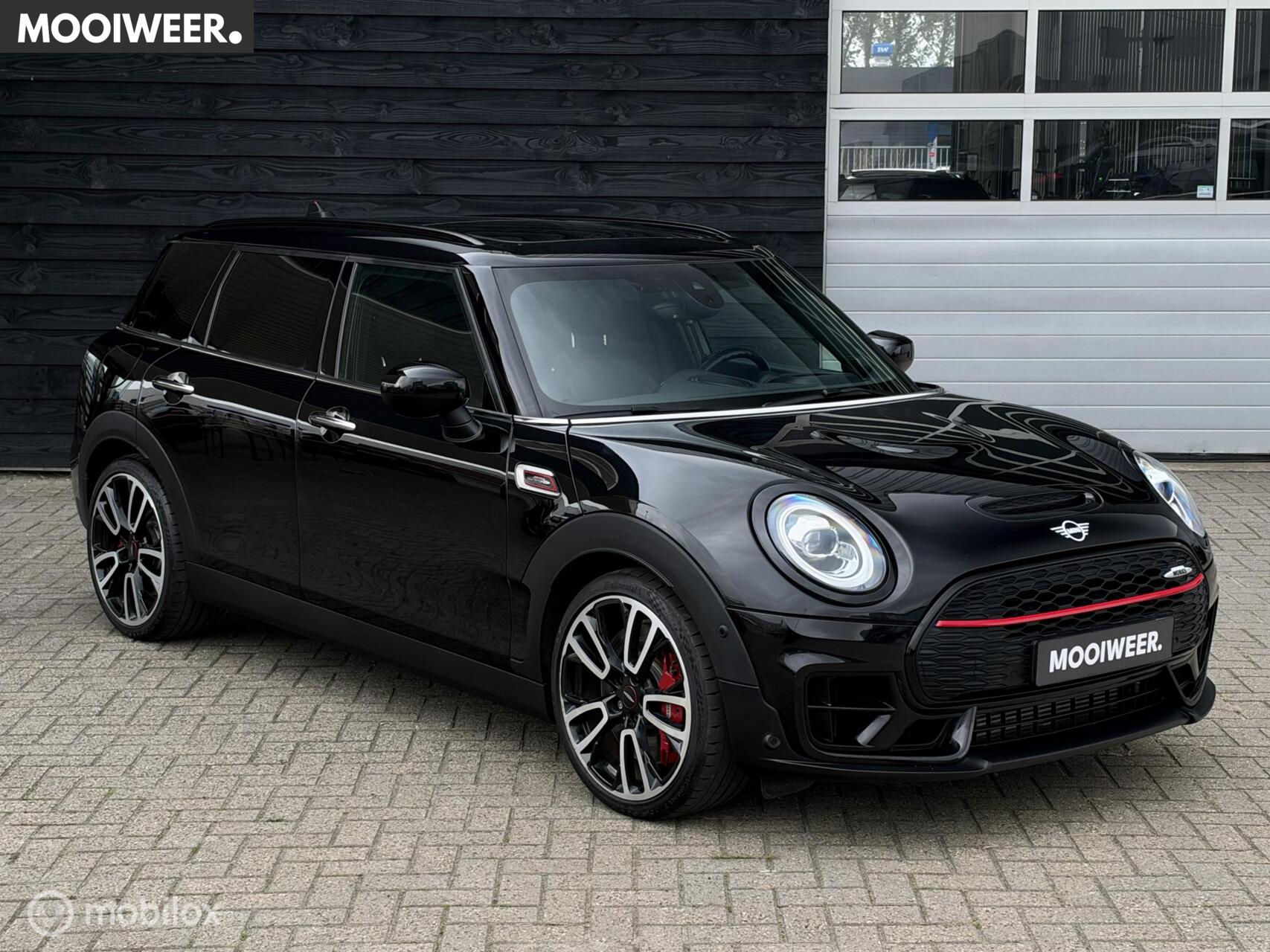Mini Clubman 2.0 JCW ALL4 Chili | Pano | HUD | Harman Kardon 2019 - voorkant