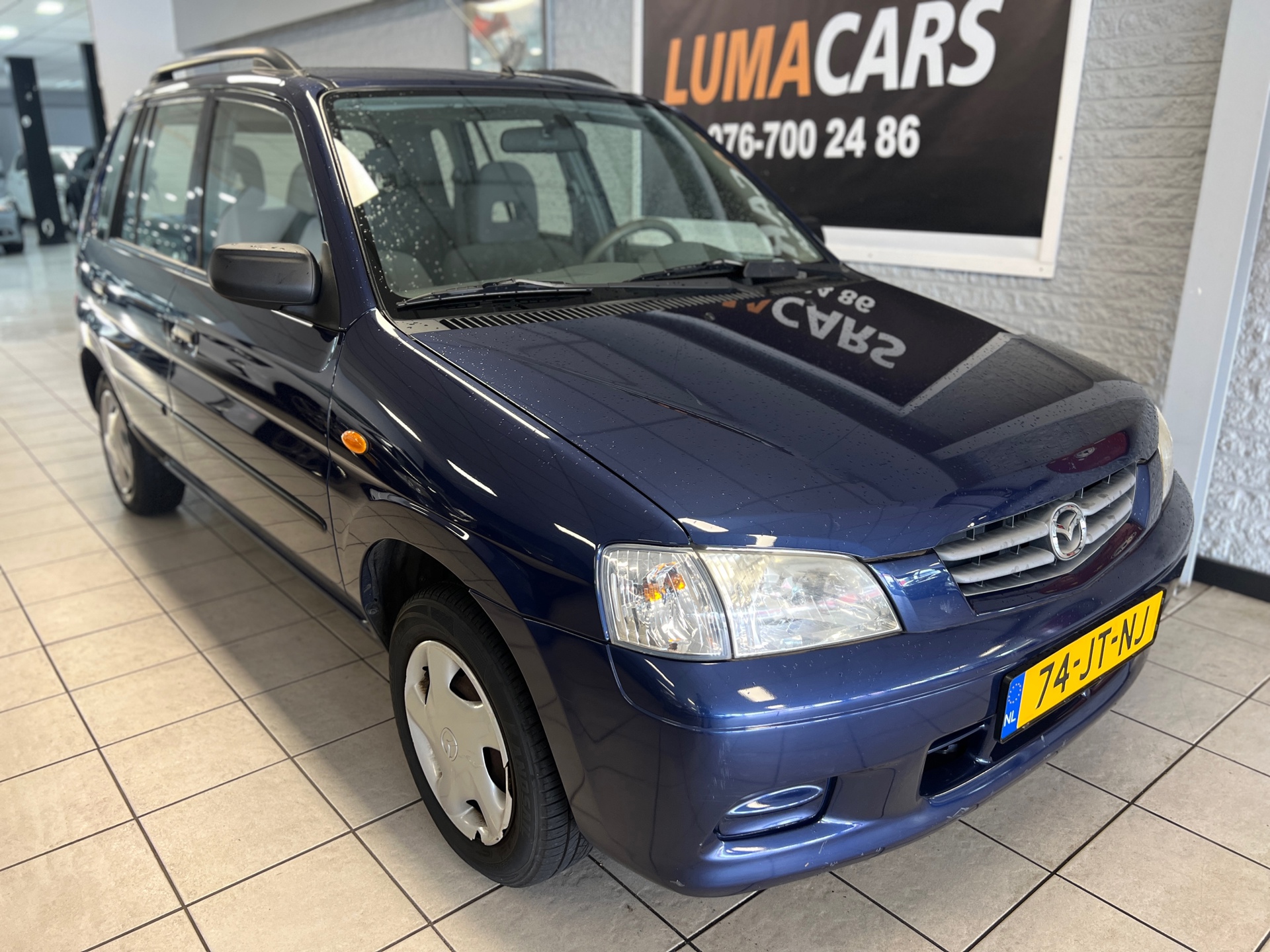 Mazda Mazda Demio 1.5 Exclusive | Nieuwe APK | Automaat | Trekhaak 2002 - voorkant