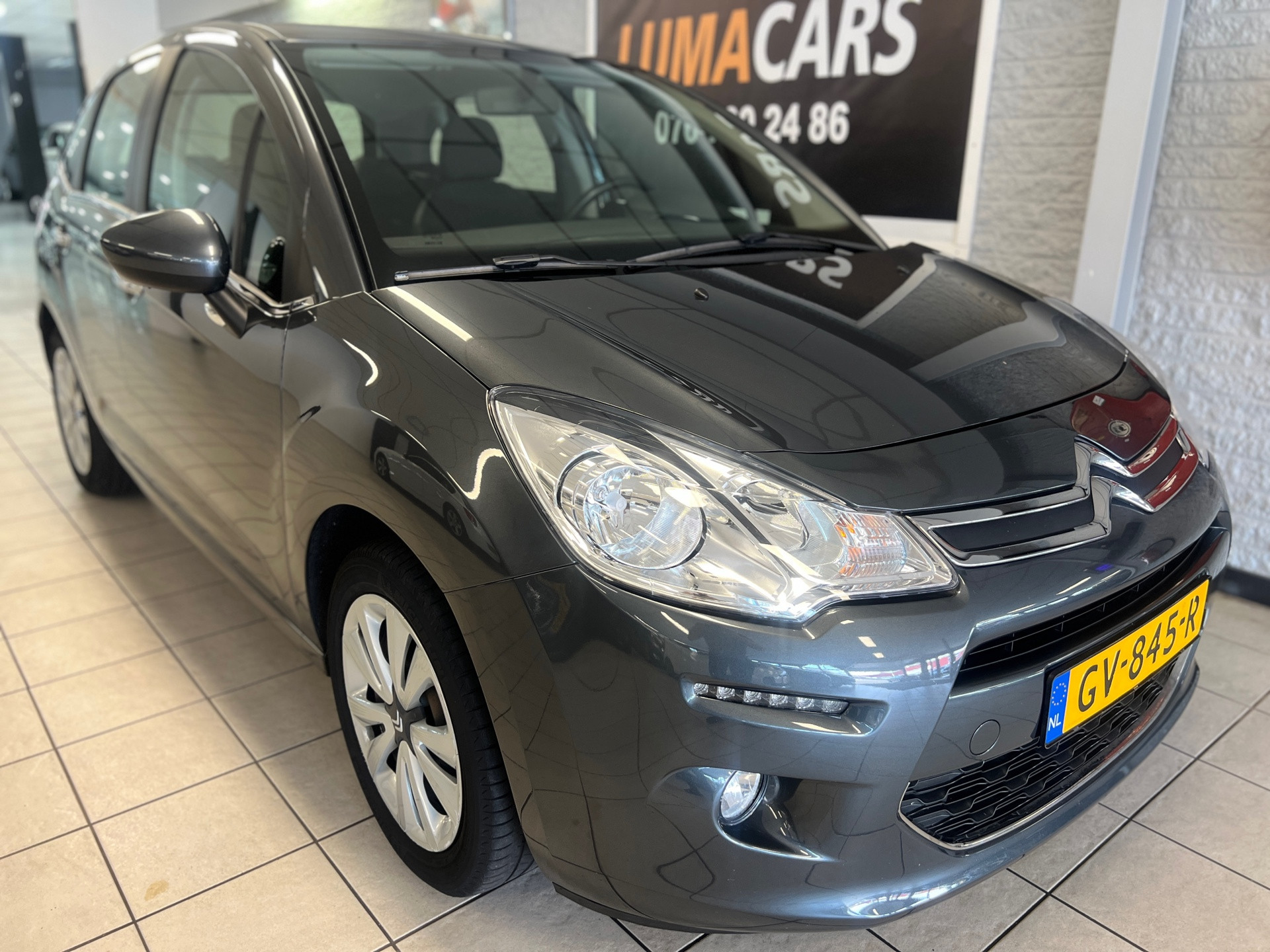 Citroen C3 1.0 PureTech Collection | Cruise | trekhaak | NAP 2015 - voorkant