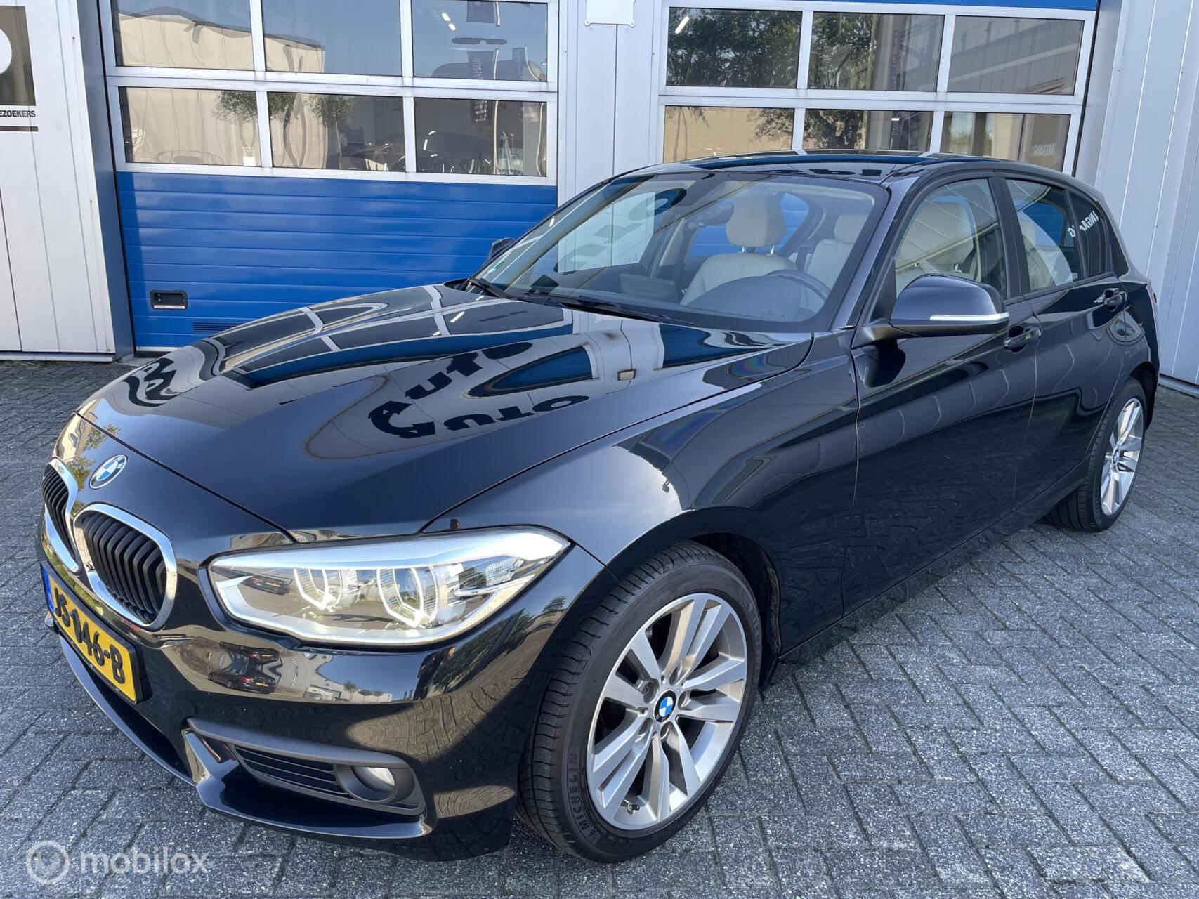 BMW 116i 116i 5D 2016 Leer-17''-Cruise-Led-Navigatie-Nap 2016 - voorkant