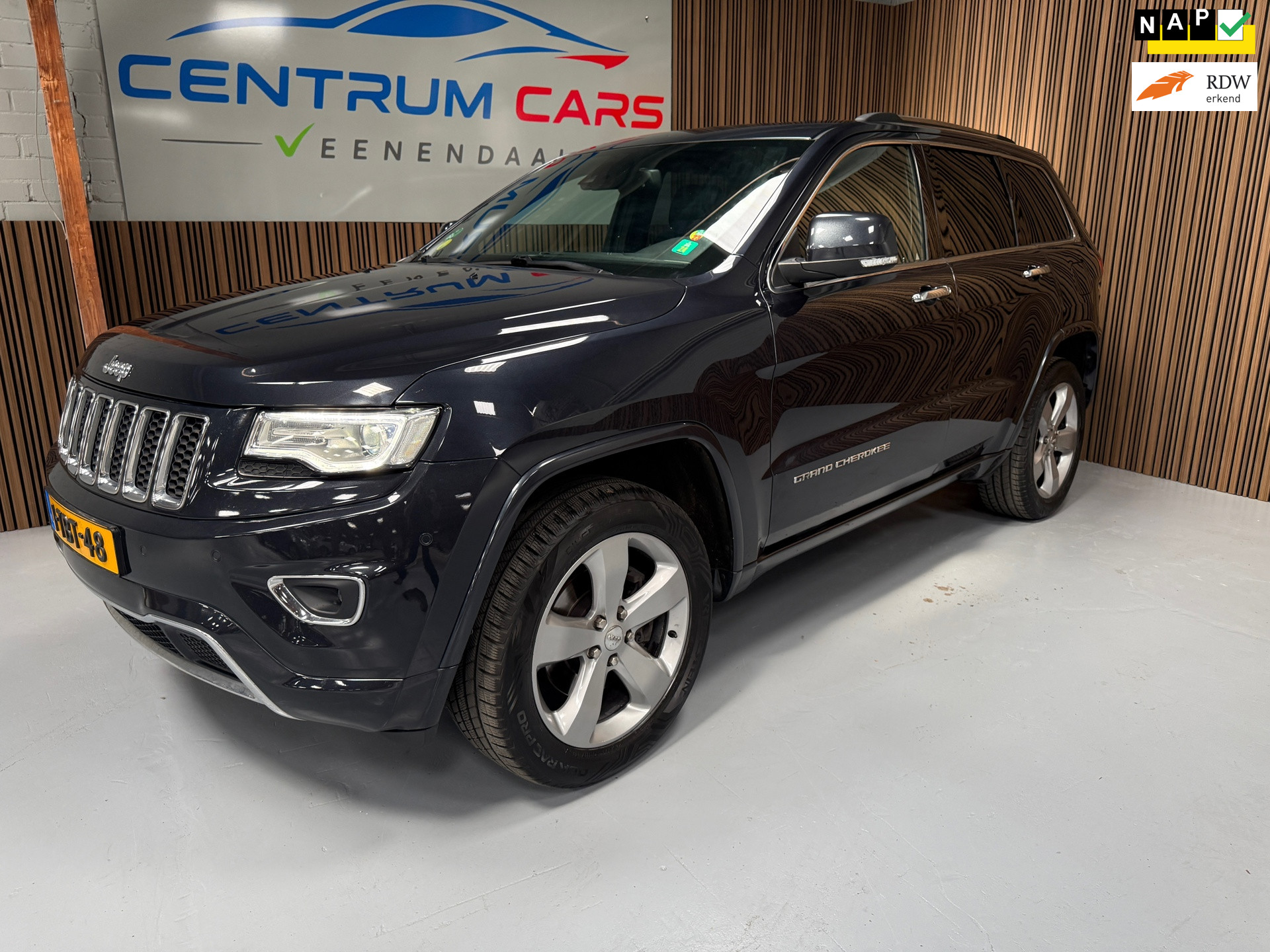 Jeep Grand Cherokee 3.0 CRD Overland. Bom vol! Pano, Trekhaak, Nederlandse auto 2014 - voorkant