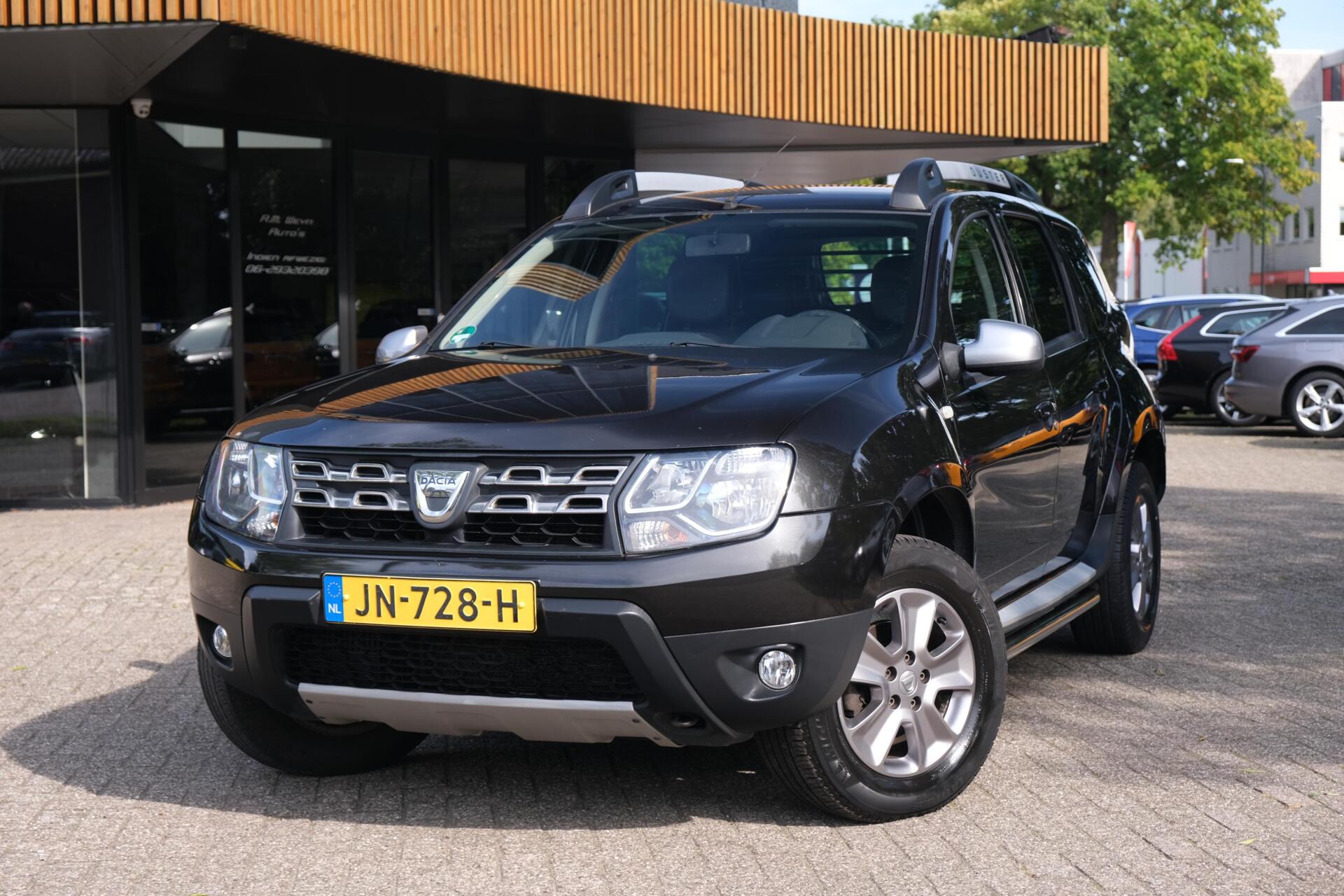 Dacia Duster 1.2 TCe 4x2 Prestige|Rijklaar!|Trekhaak|PDC|Leer|Bluetooth|Dealeronderhouden|Ketting v.v. 2016 - voorkant