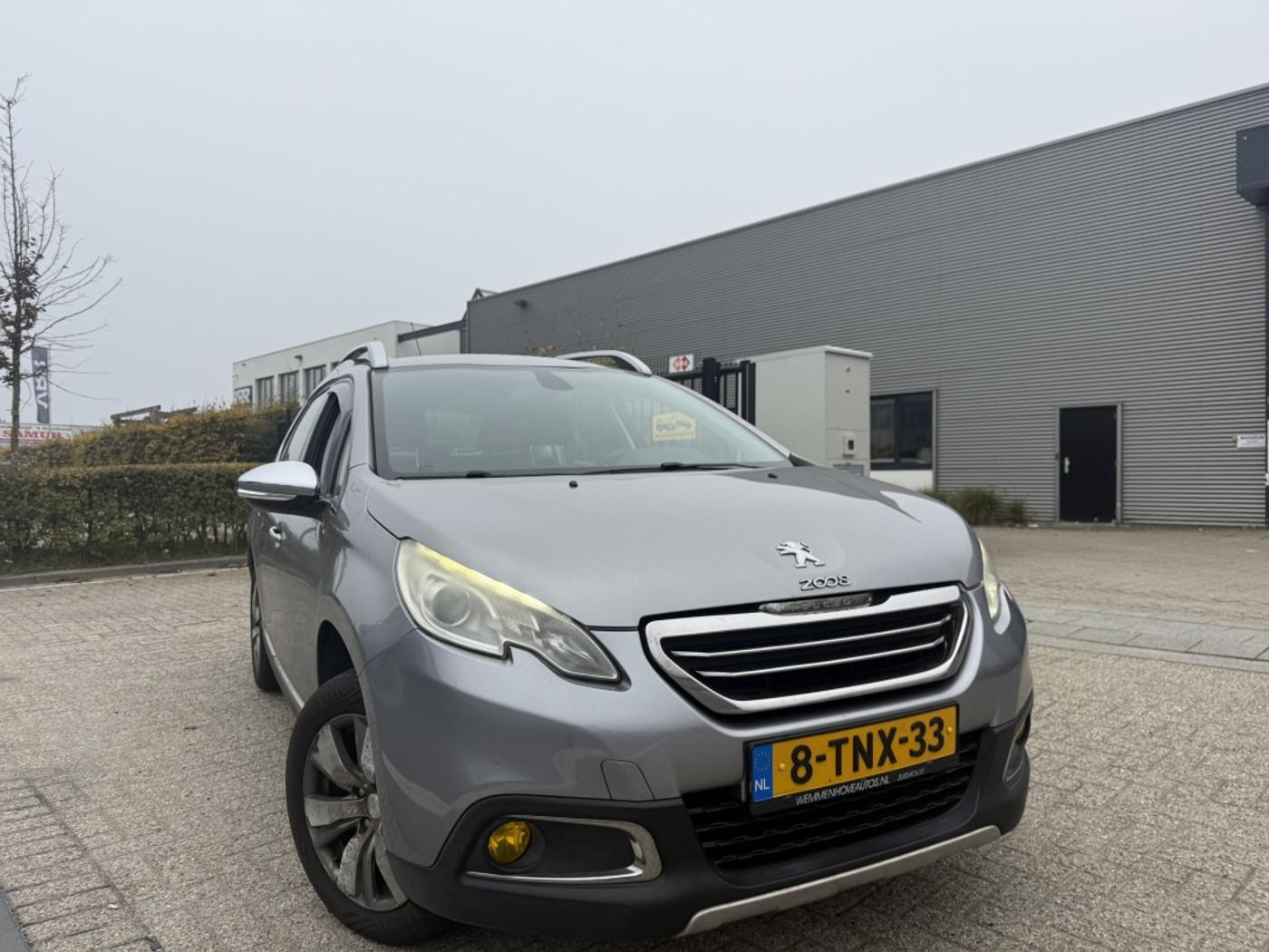 Peugeot 2008 1.6 e-HDi Allure 2014 - voorkant