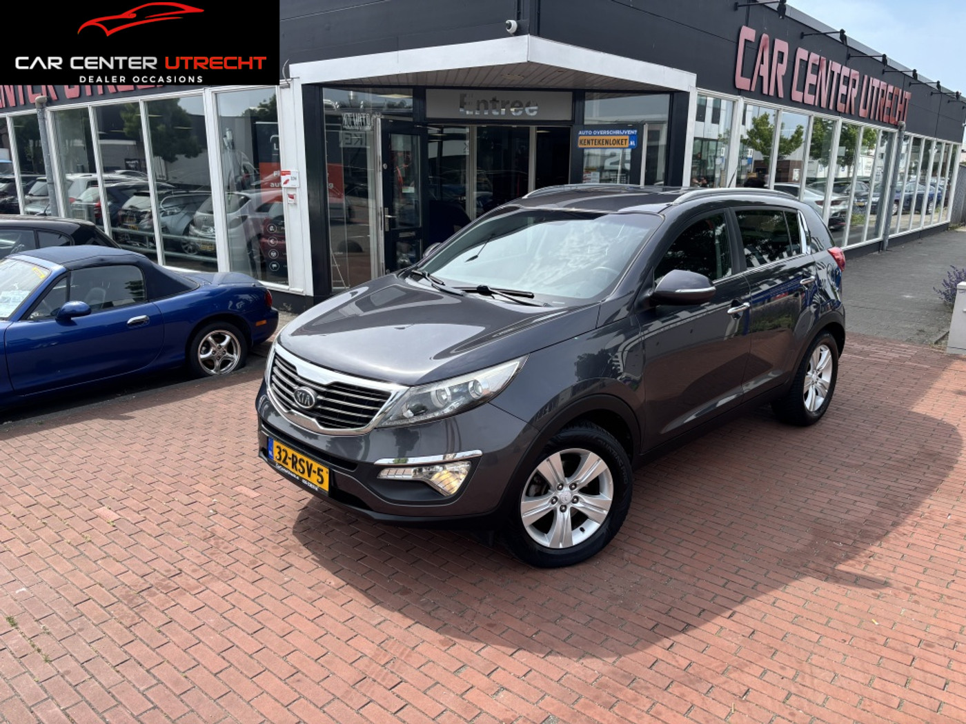 Kia Sportage 1.6 GDI X-ecutive + | camera | leder | navi | hoge instap | 2011 - voorkant