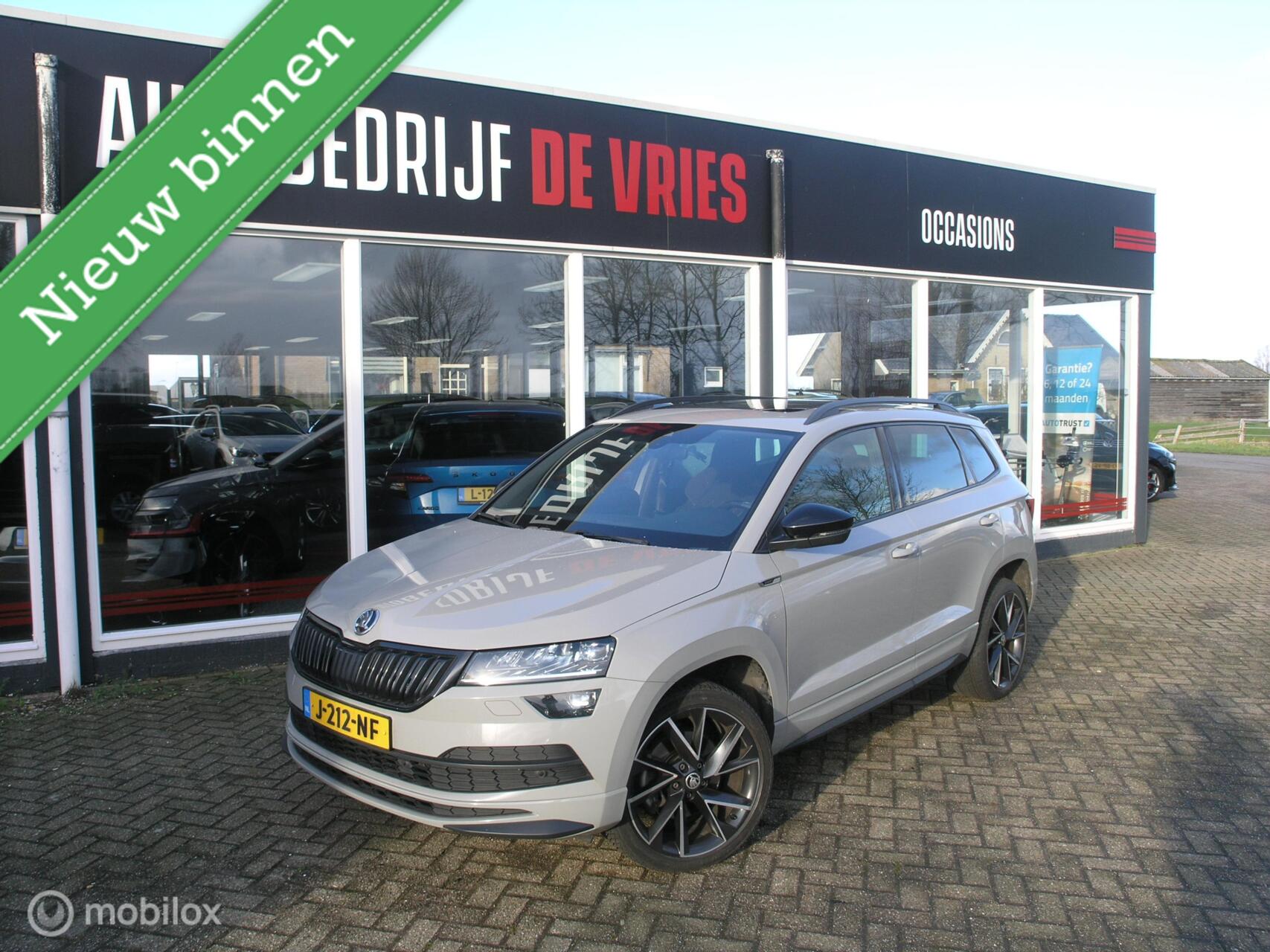 Skoda Karoq 1.5 TSI ACT Sportline Bsns Pano/Canton/ACC/Trekhaak 2020 - voorkant