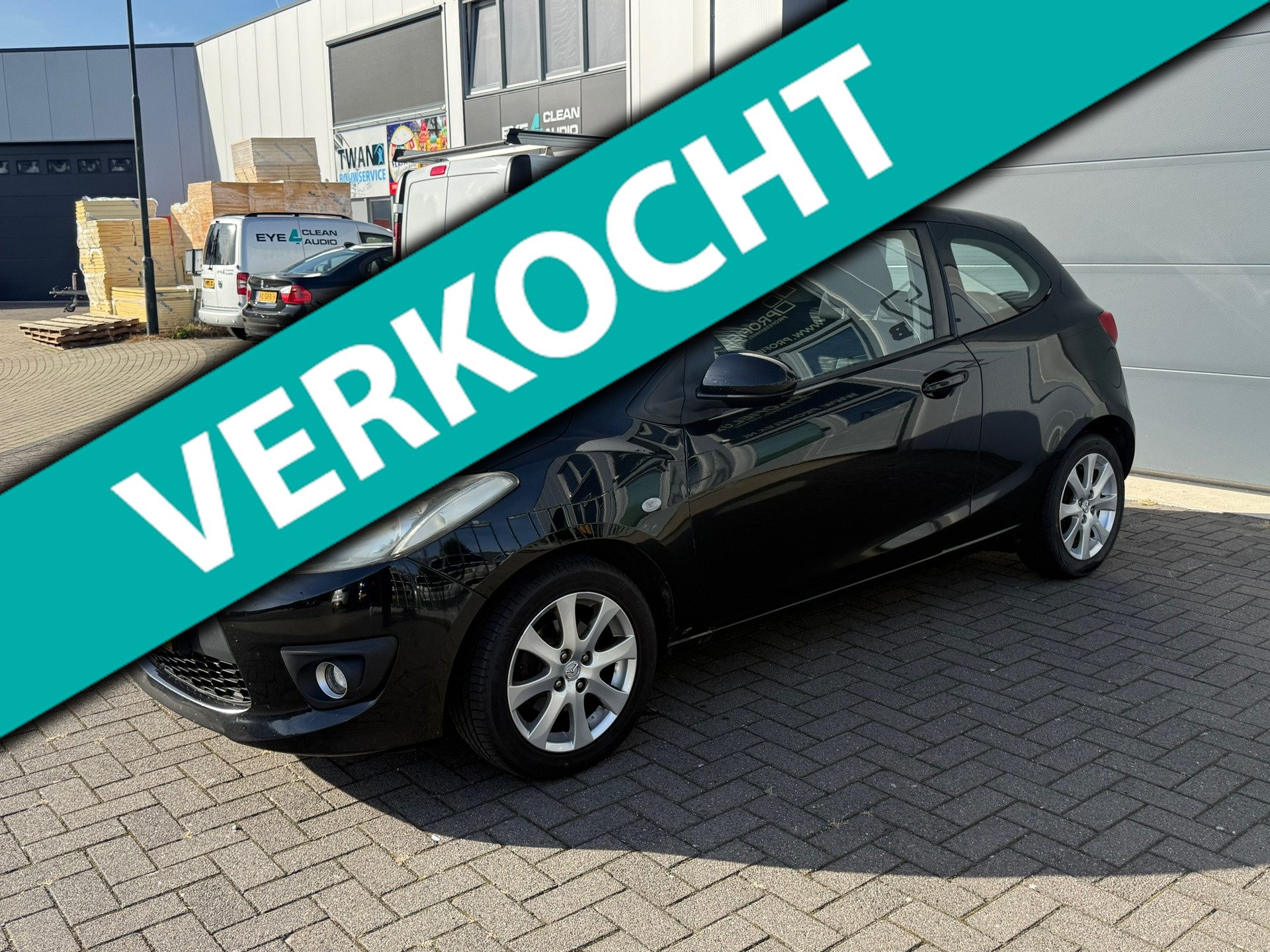 Mazda 2 1.3 AIRCO | ELEKTR PAKKET | CARPLAY | NIEUWE APK | 2009 - voorkant