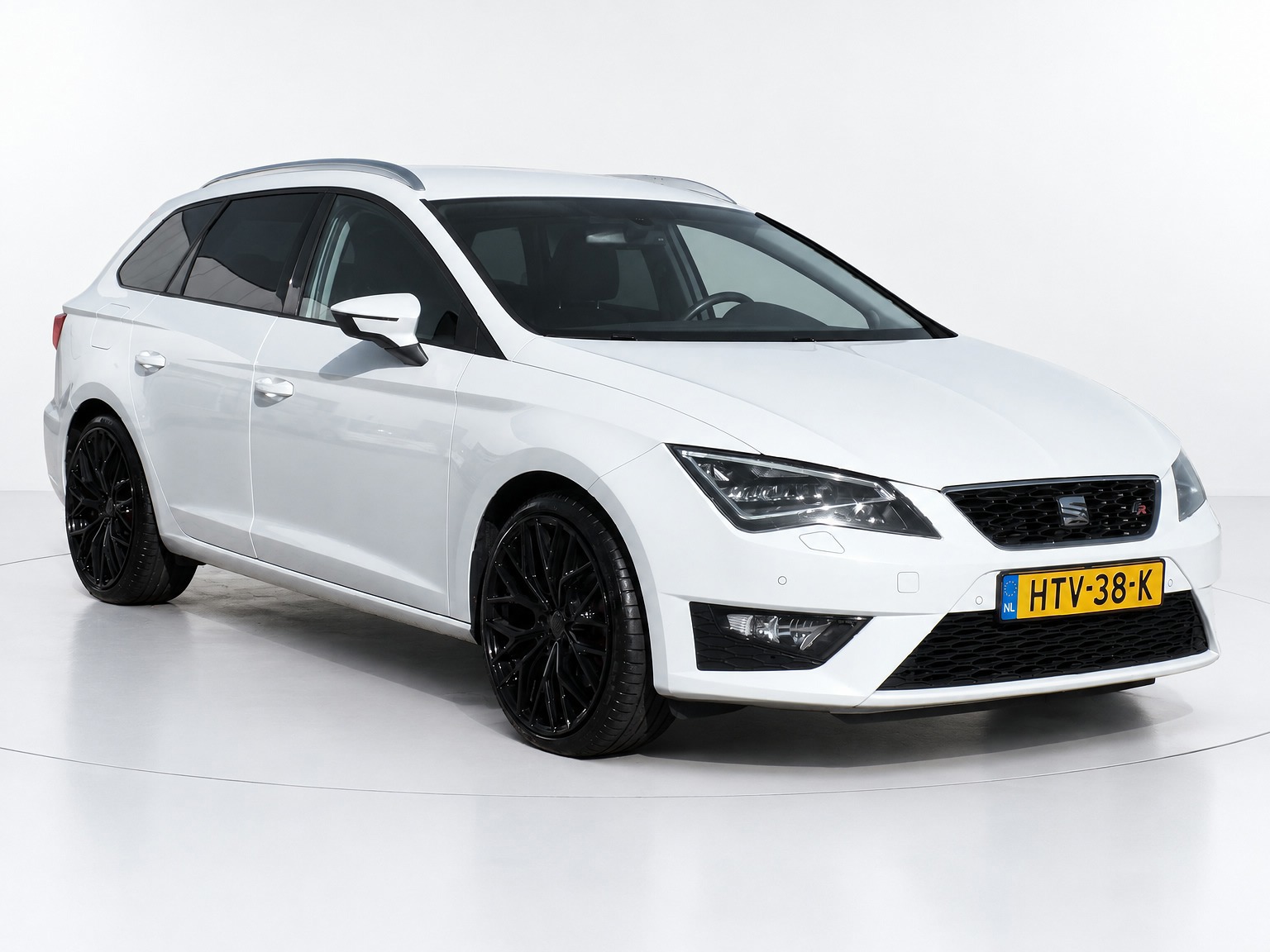 Seat Leon ST 1.8 TSI FR Business|LED|Navi|AUT|BT|Cruise|PDC 2014 - voorkant