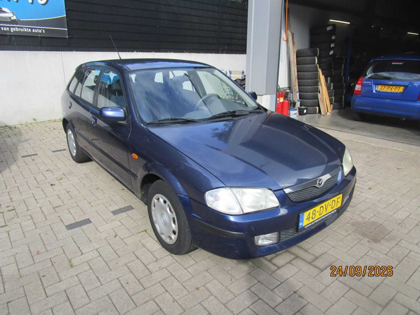 Foto van Mazda Mazda 323f