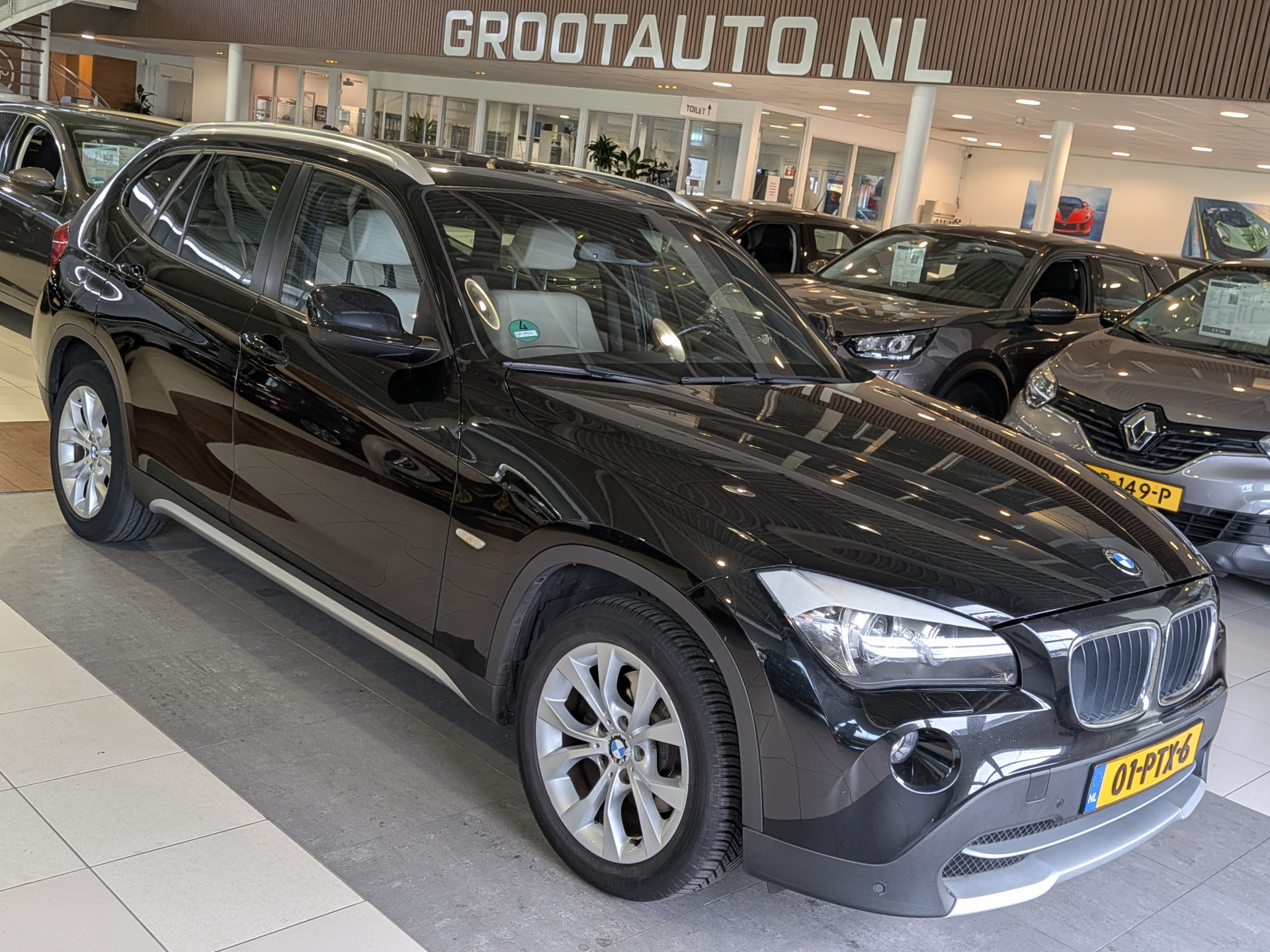 BMW X1 sDrive 18i sDrive18i Automaat 2010 - voorkant
