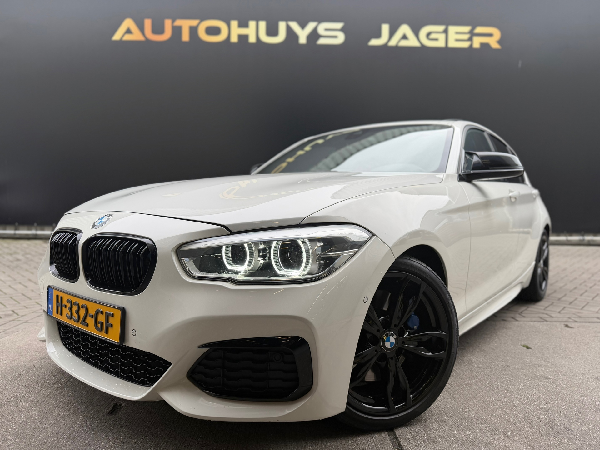 BMW M140i MW 1-serie M140i High Executive Schuifdak h&K Leer Performance 2017 - voorkant