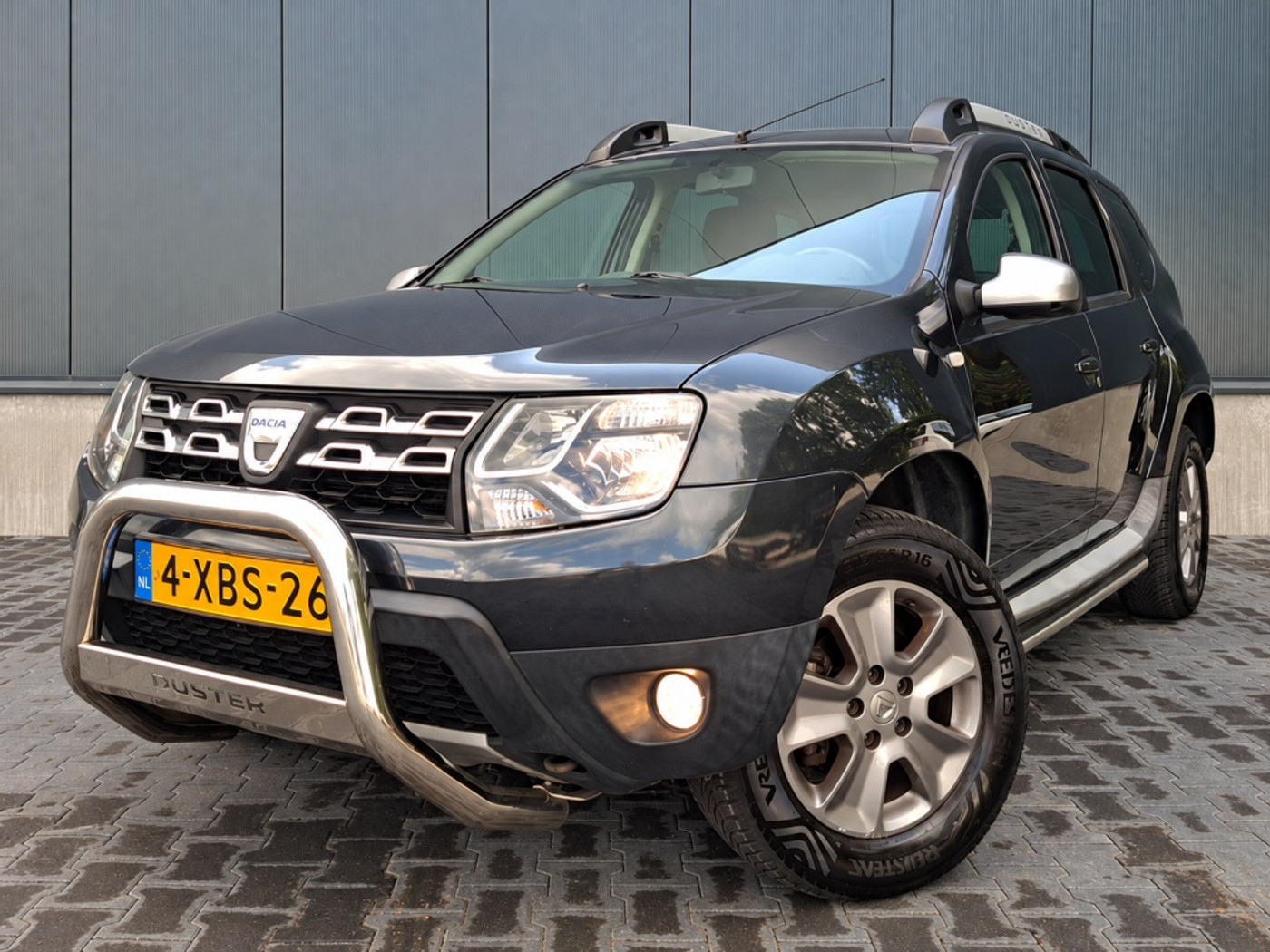 Dacia Duster 1.2 TCe 4x2 Prestige | Airco | Trekhaak | Bluetooth | NAP | All seasonbanden 2014 - voorkant
