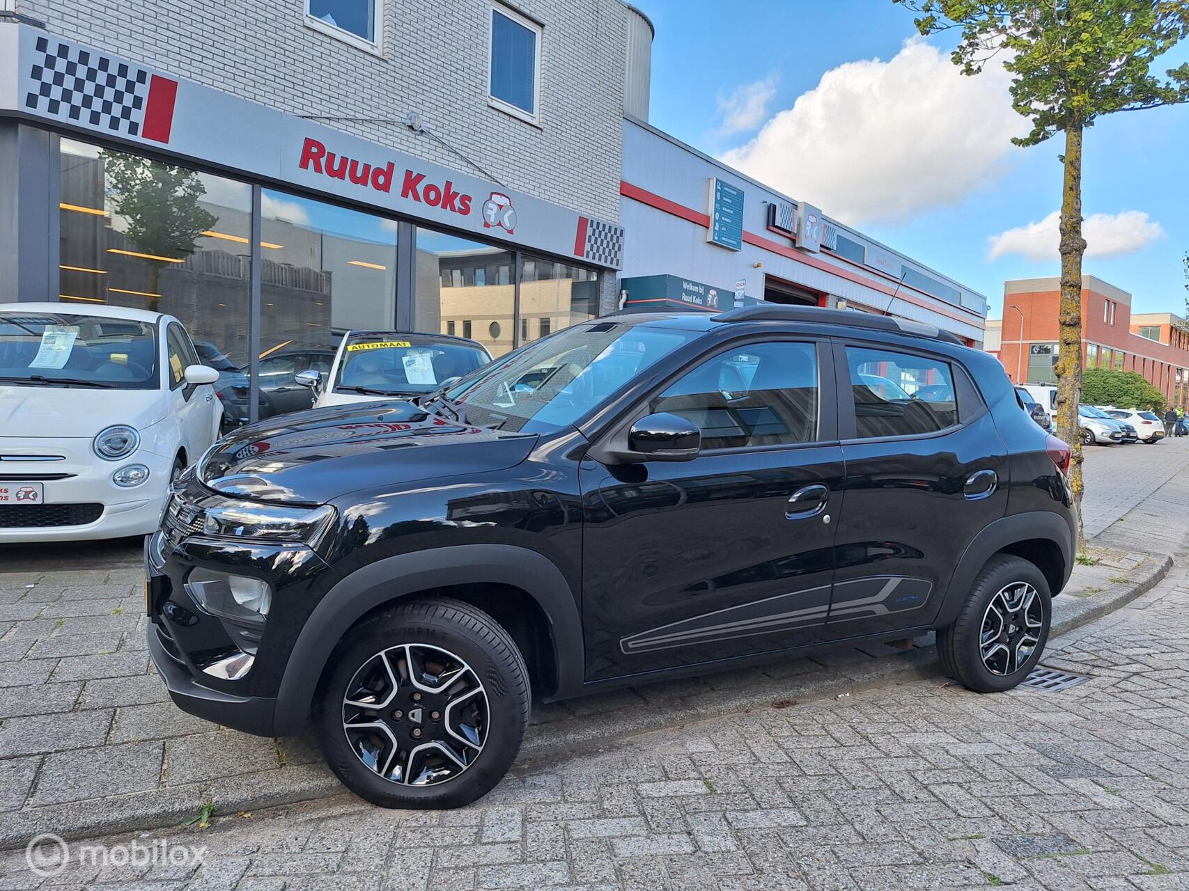 Dacia Spring COMFORT PLUS  (ORANGE PACK) 27 kWh • 1E EIGENAAR • 2023 - voorkant