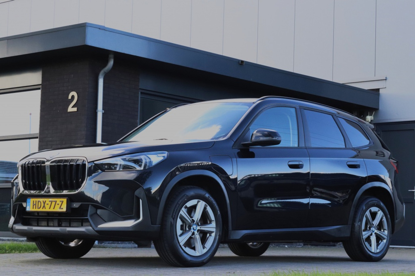 BMW X1 xDrive30e xLine I Leder I Trekhaak I SOH 92% 2024 - voorkant