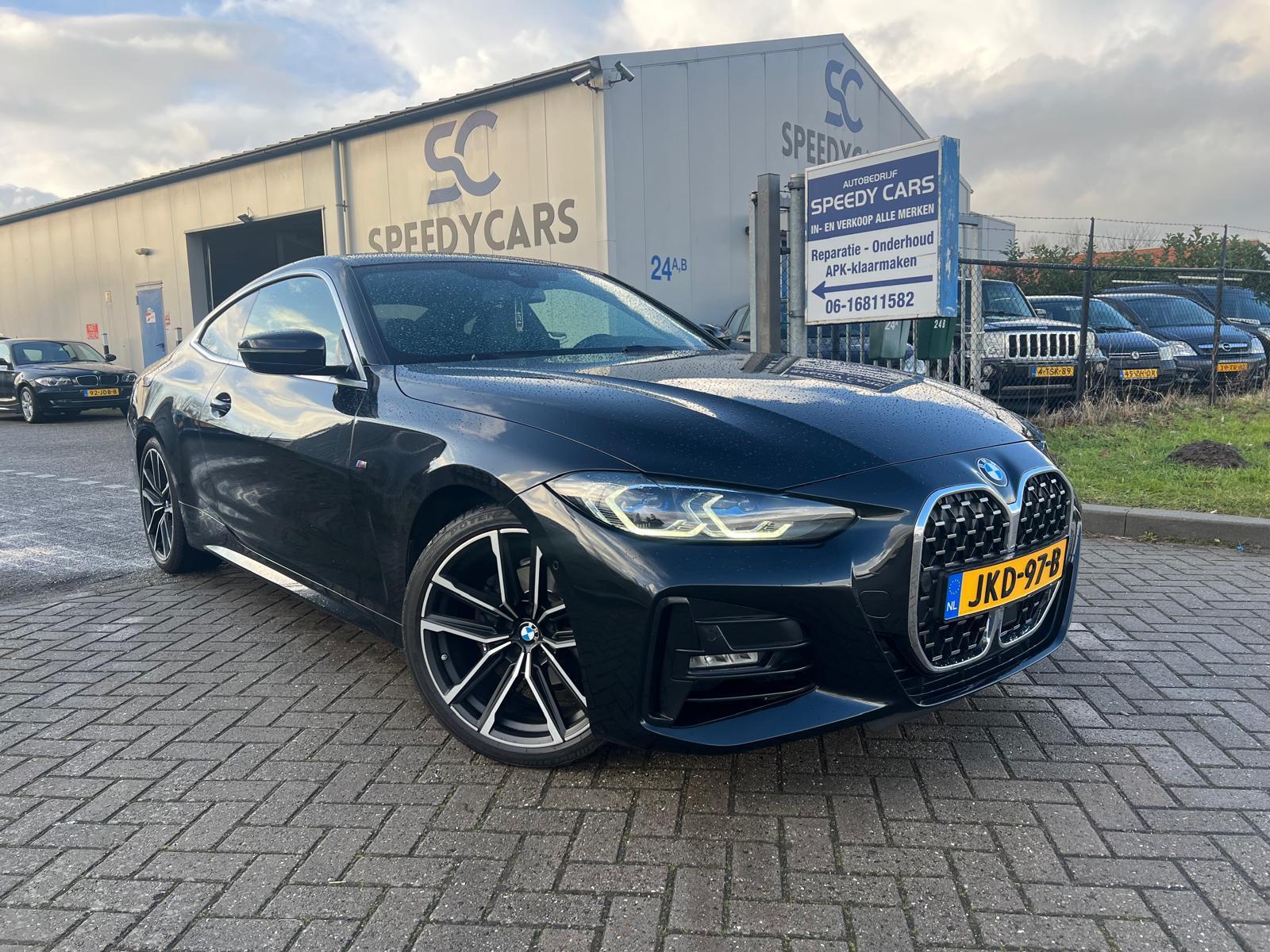 BMW 4-serie Coupé 420i High Executive M-Pakket Trekhaak Full 2021 - voorkant