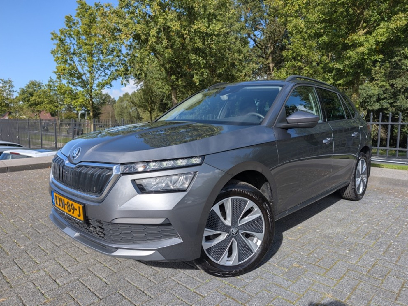 Skoda Kamiq Tour de France 1.0 110PK | Trekhaak | Carplay | Stoelverw. | LED | PDC | ACC | Climate control 2023 - voorkant