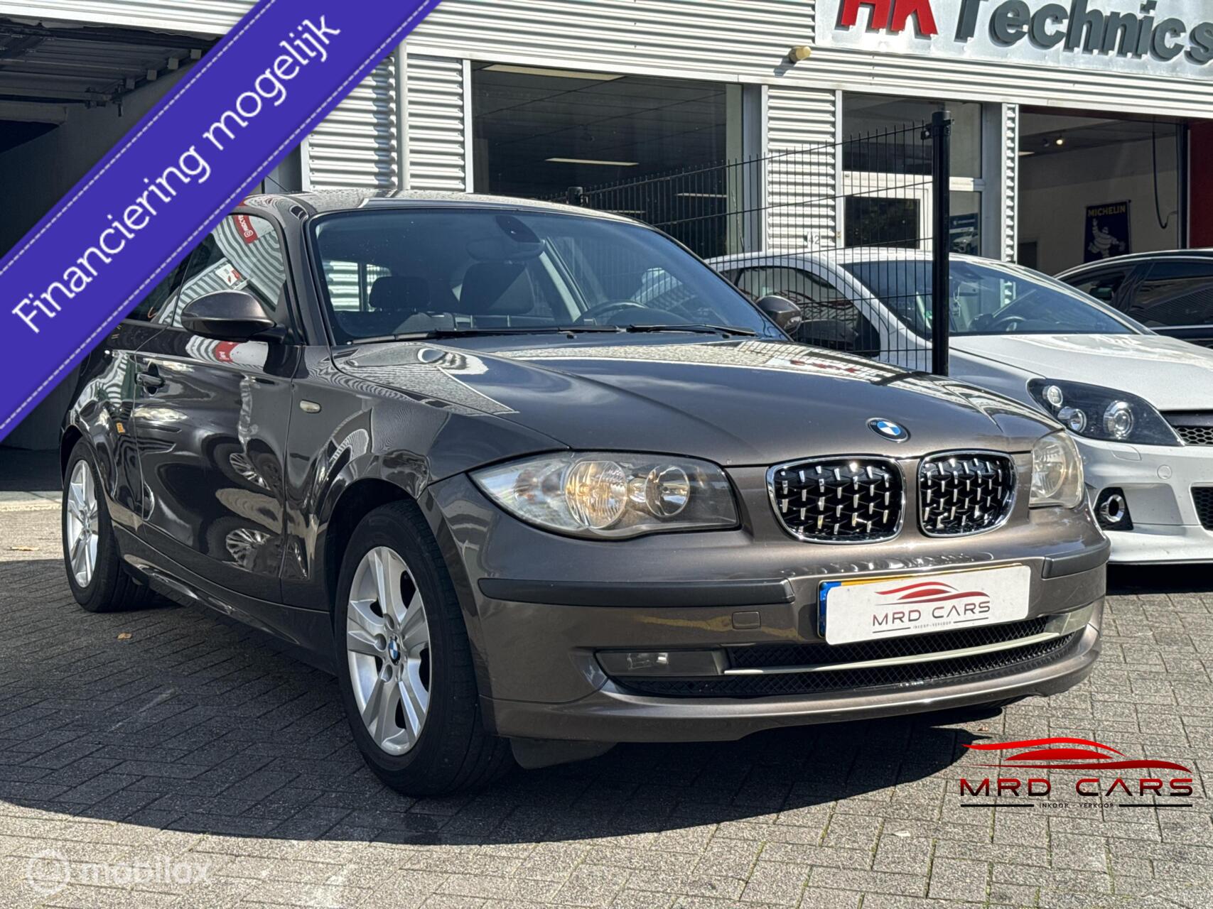 BMW 1er Reihe 116i High Executive |VOL OPTIE|DEALEROND| 2009 - voorkant